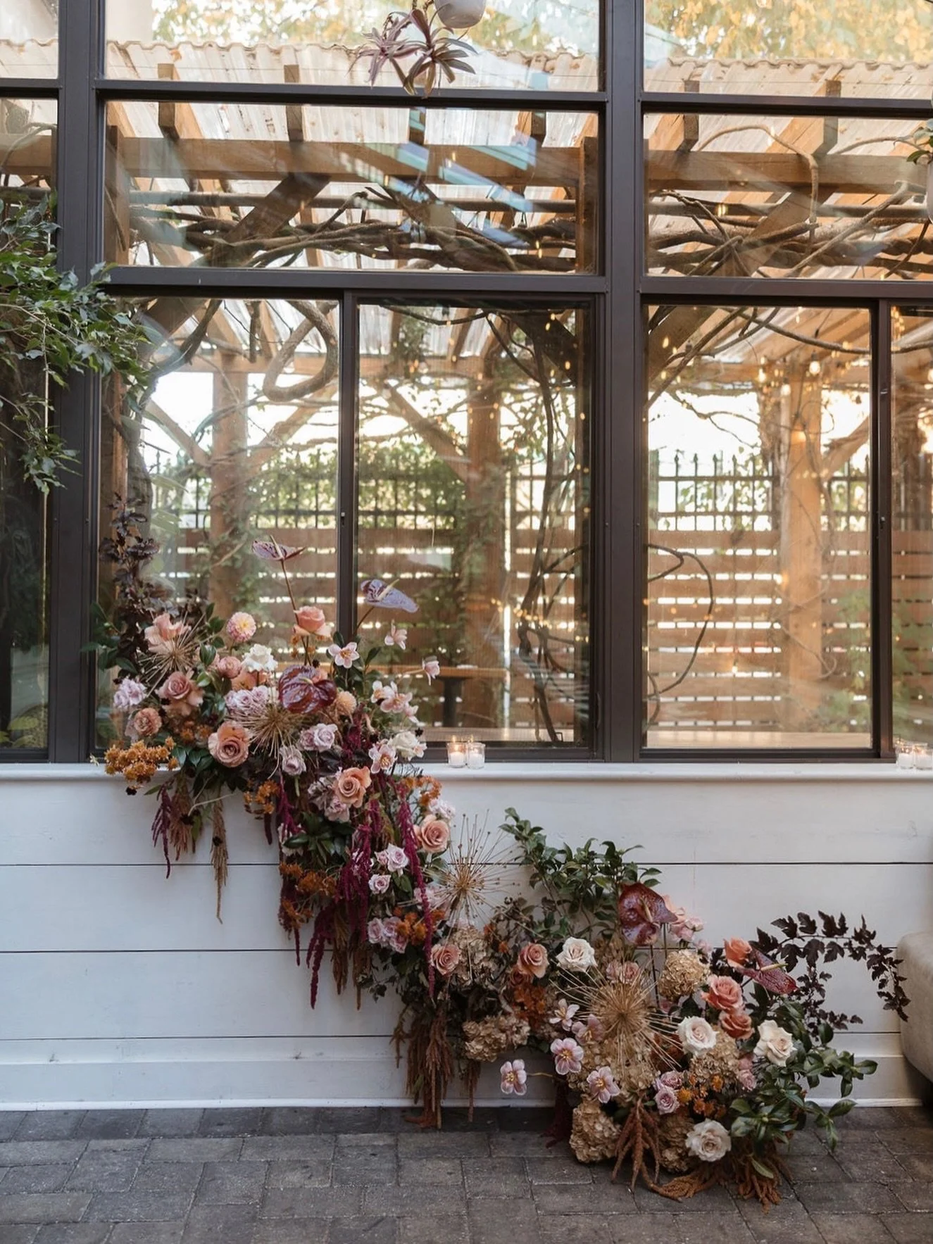 One more photo from this set by @darbyshayephoto&mdash;a ceremony cascade @osteriaphillyweddings. 🌹