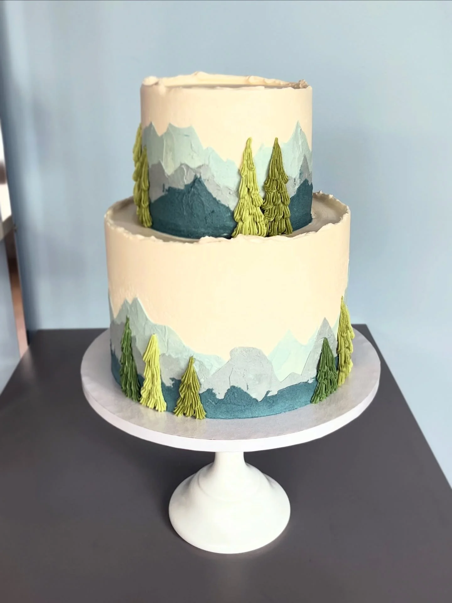 Our &ldquo;Mountain&rdquo; design is one of the newer additions to the online store and it has been a hit! This two-tiered version is for Stephanie and Chintan, all vegan, in two of our best selling flavors: Seattle Fog (Earl Grey cake + bergamot cre