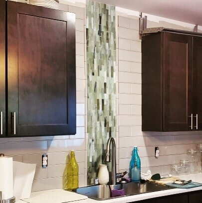 Backsplash alert!!! Finally got a chance to spend a day getting our backsplash up at home. Need to order a few more trim pieces and then it's off to grout for this bad boy. 
#triplerhomeservices #qualitycraftsmanship #tilebacksplash #backsplashtile #