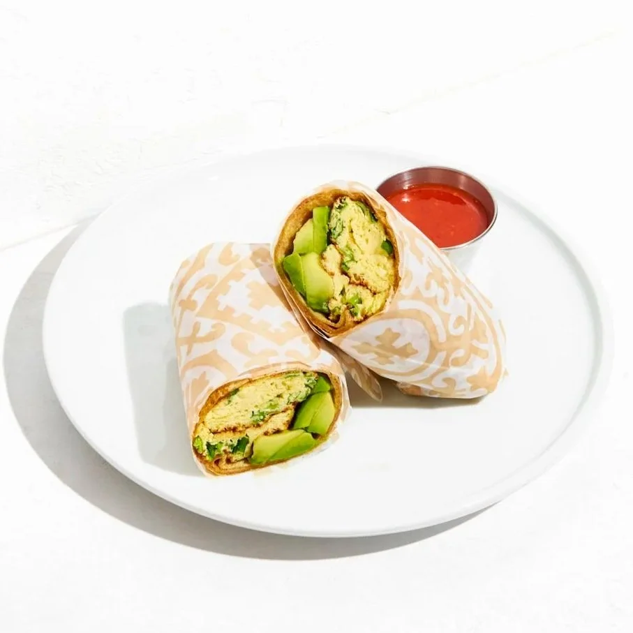 breakfast burrito with picante sauce on the side