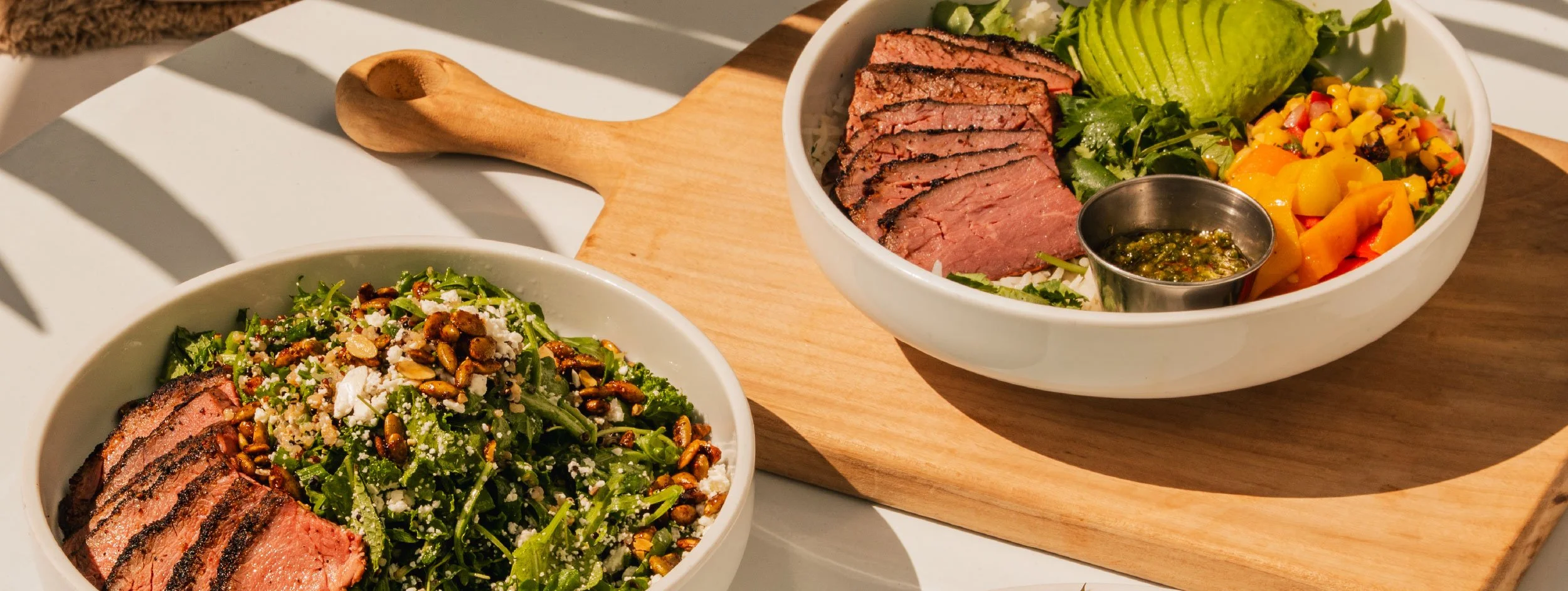 grass-fed steak plate and grass-fed steak bowl