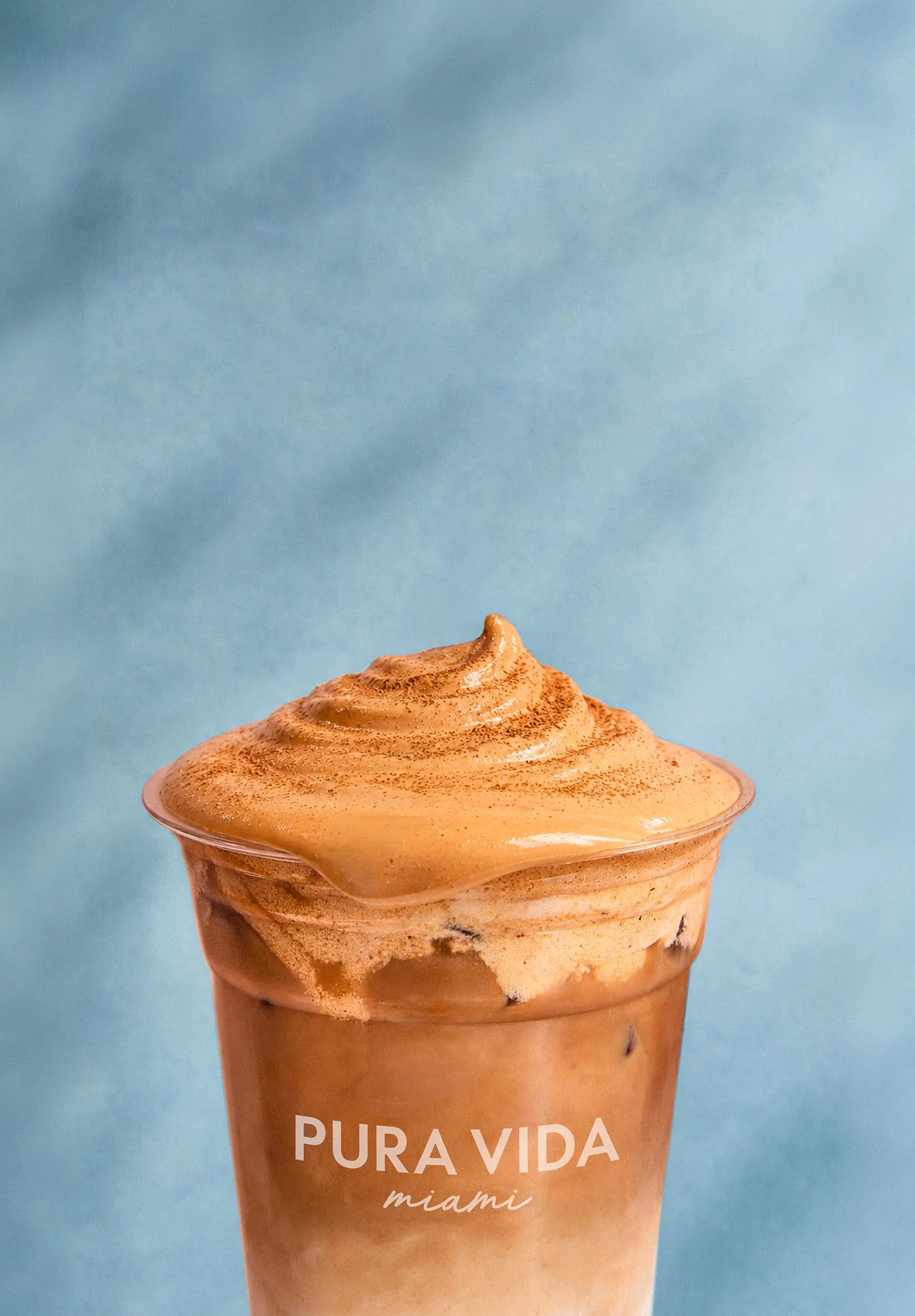 Pumpkin Spice Cloud in a pura vida miami branded cup