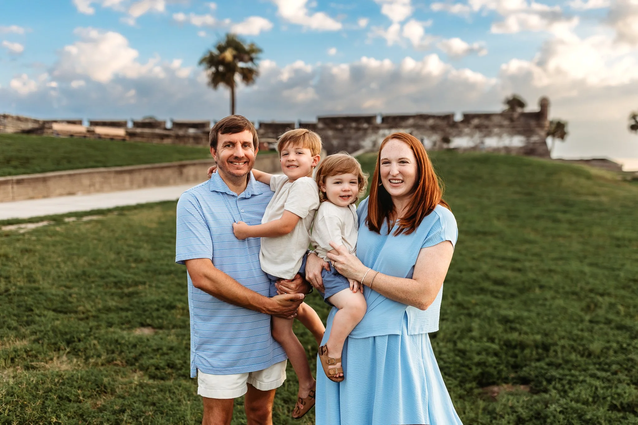 "Children walking beside the historic fort in St. Augustine.