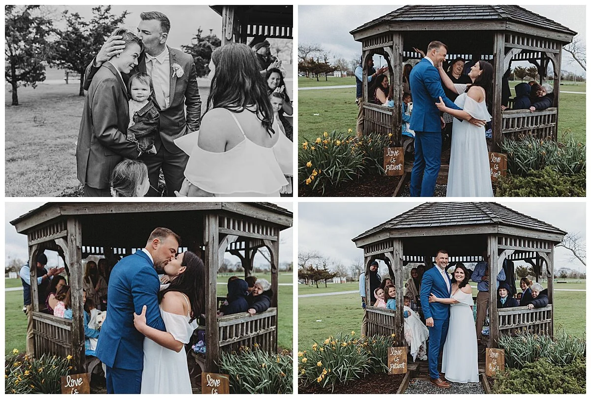 newly married couple kissing in front of a gazebo in a park in st augustine