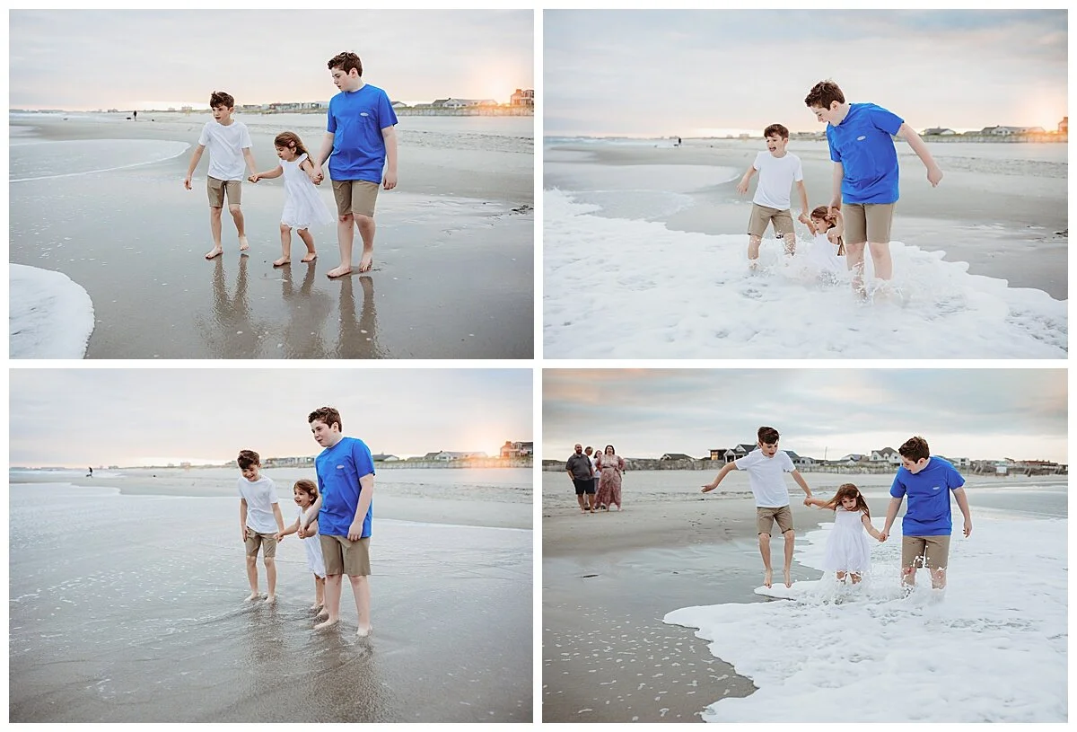kids jumping in the ocean at sunset and laughing