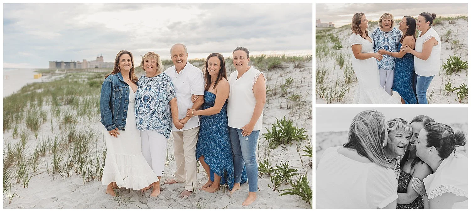daughters dressed in blue and white embracing mom and dad and laughing while standing on a dune near Lido towers