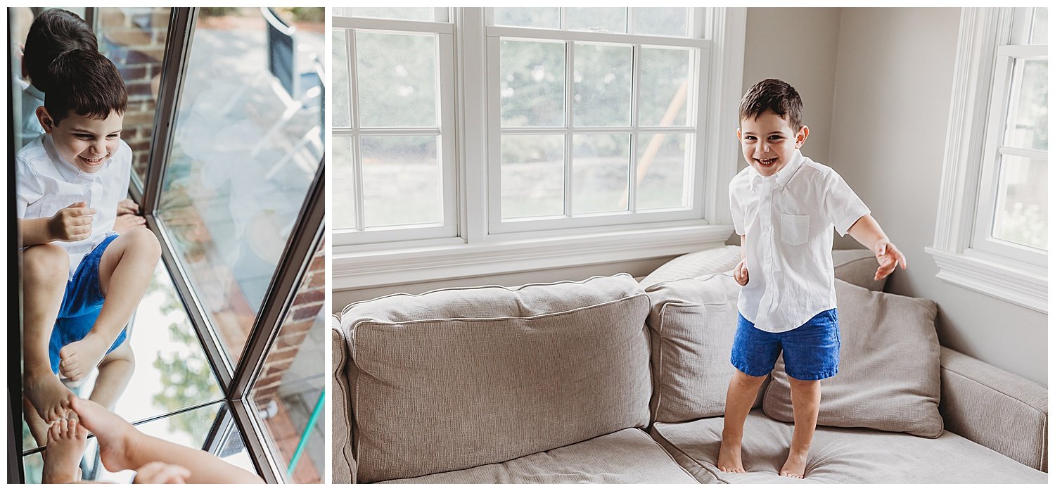 toddler boy jumping on a couch and laughing