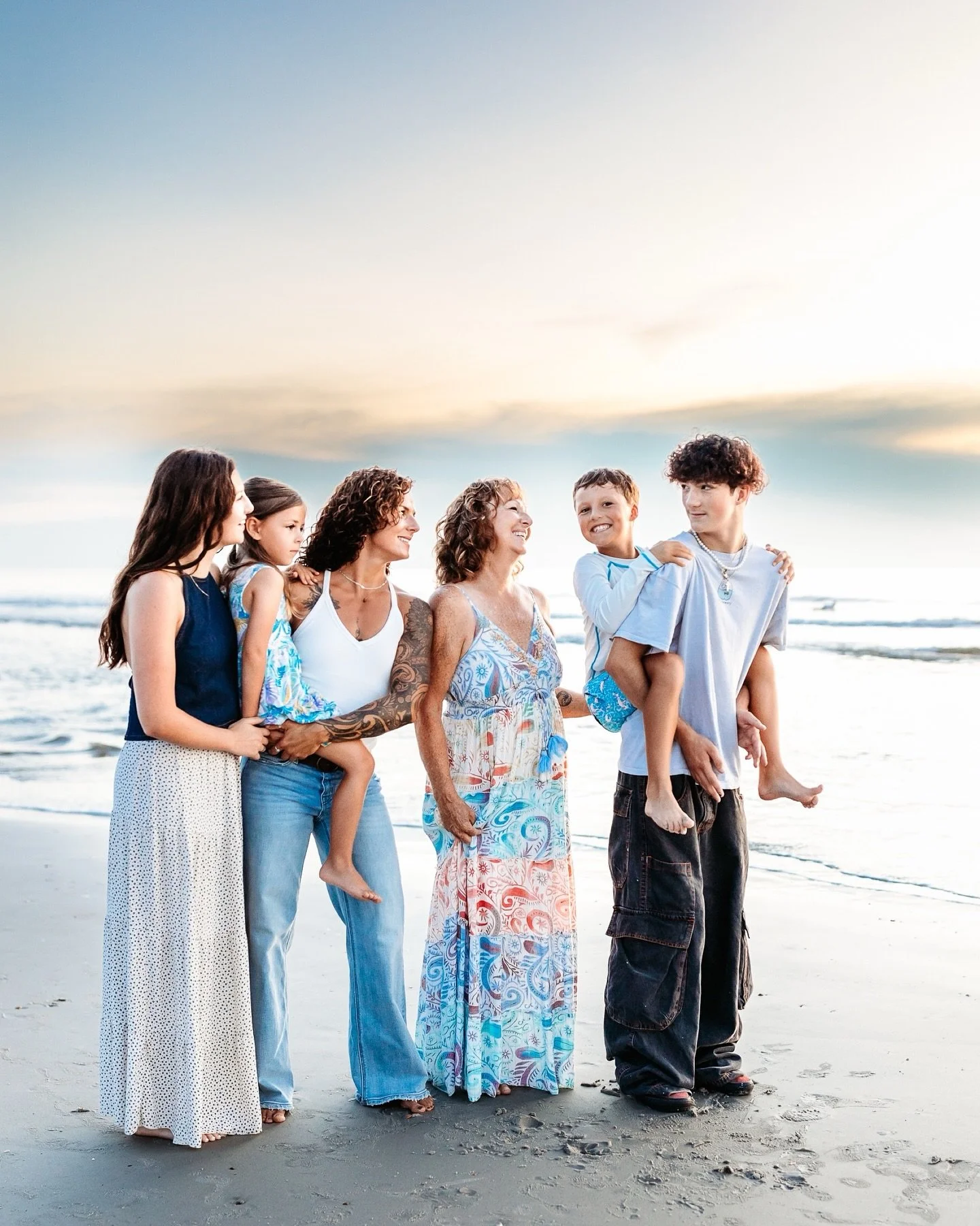 The beach at sunrise is calm, quiet, and unhurried.  That&rsquo;s why I love photographing families here in the early morning. No crowds. No cranky evenings. Just softness, connection, and a little bit of magic before the day begins.
My approach isn&