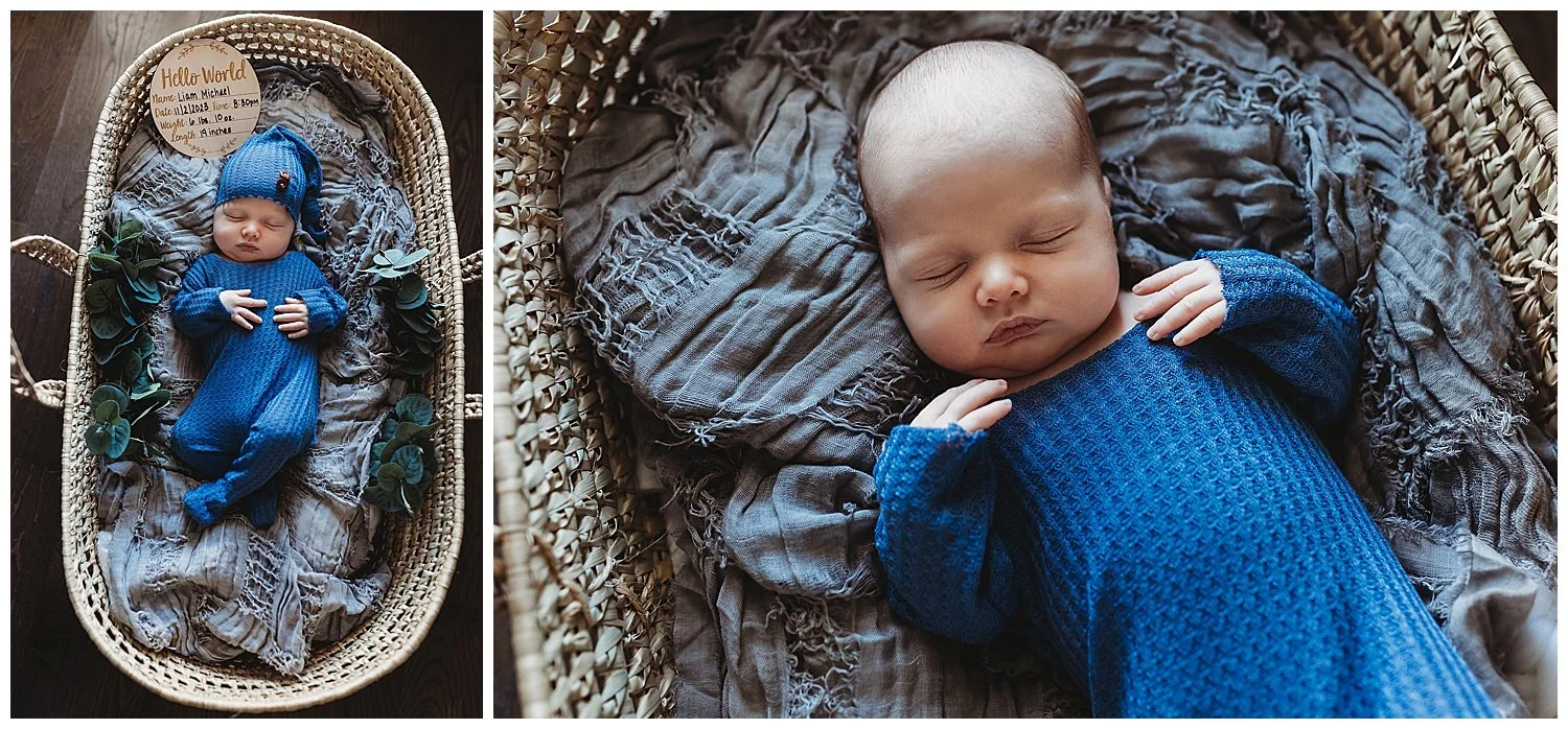 baby in blue periwinkle waffle jumper sleeping in a moses basket with wood welcome to the world sign baby sleeping on a grey textured rustic blanket
