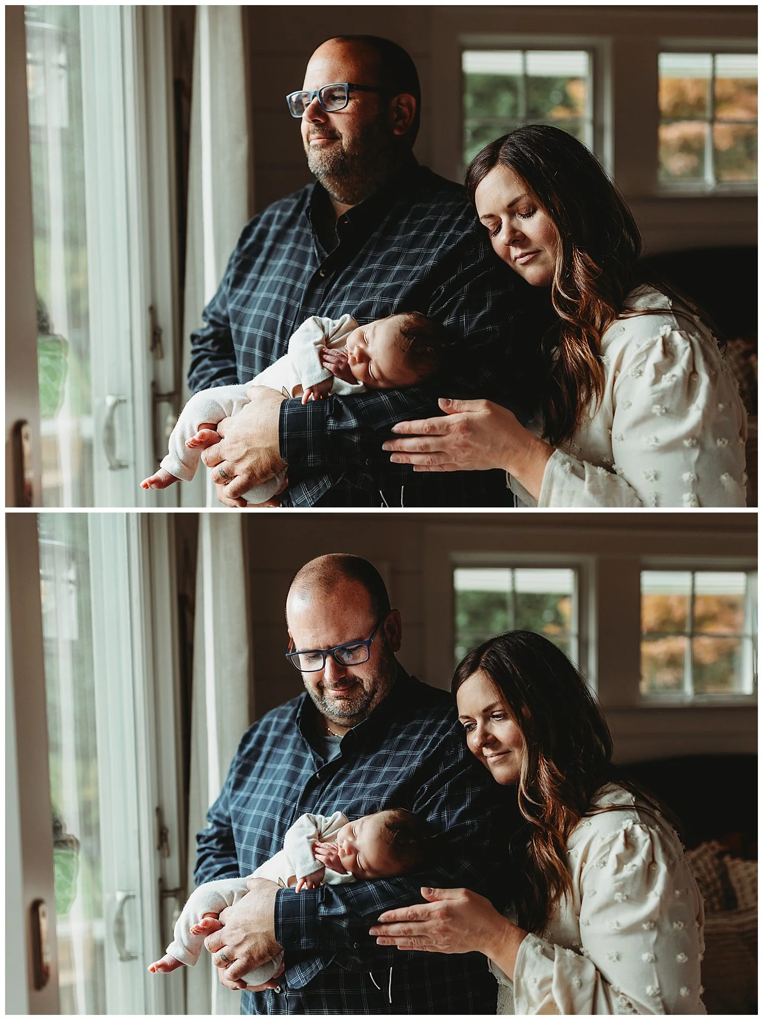 couple by window dad looking out window while holding baby mom resting head on shoulder with eyes closed baby sleeping