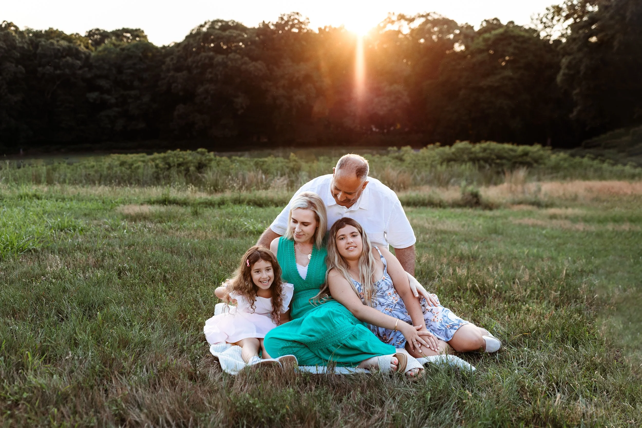 daily state din the grass at sunset and they are embraced