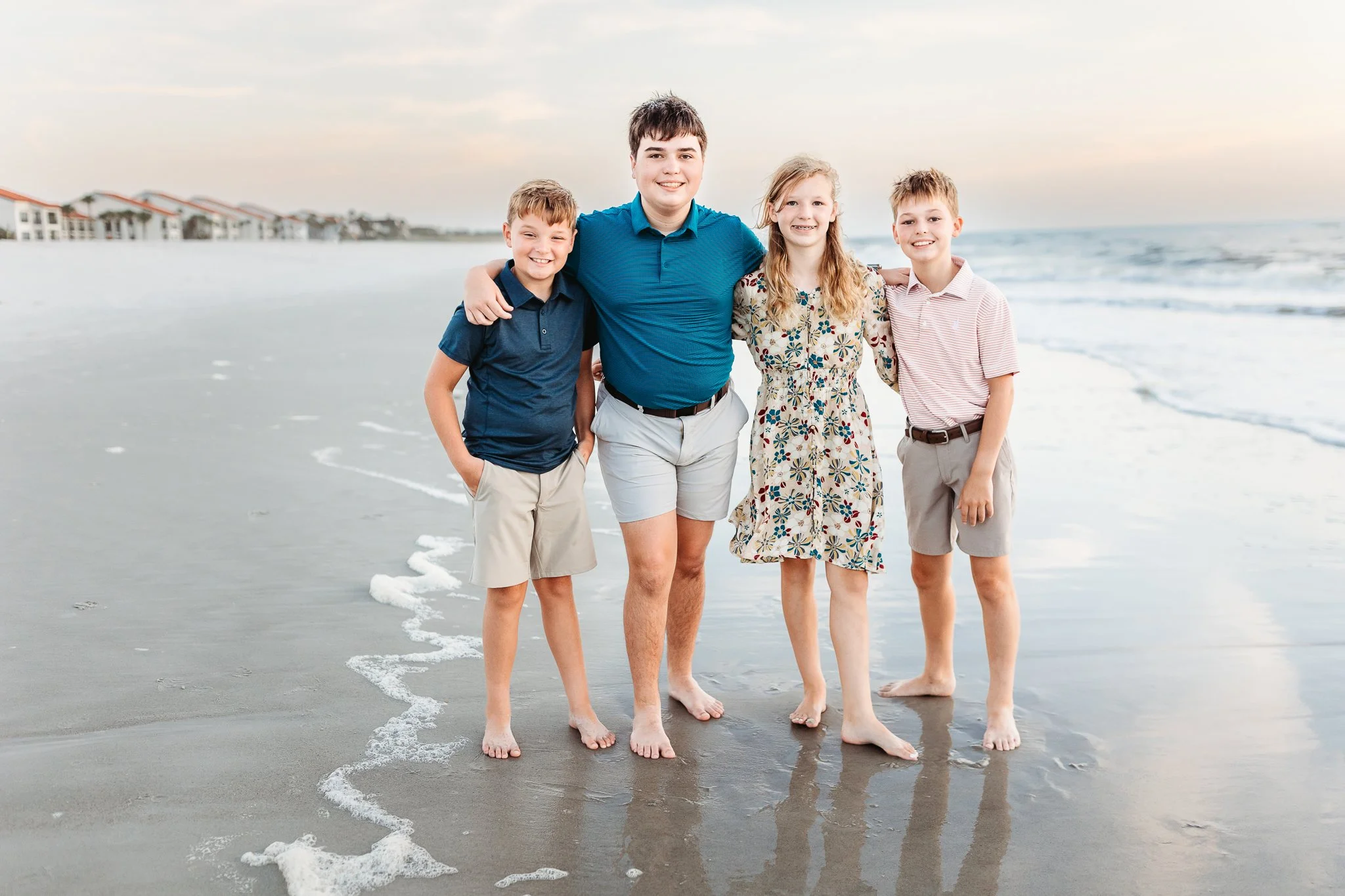 a photo of cousins on the beach together during a vacation to the st Augustine area