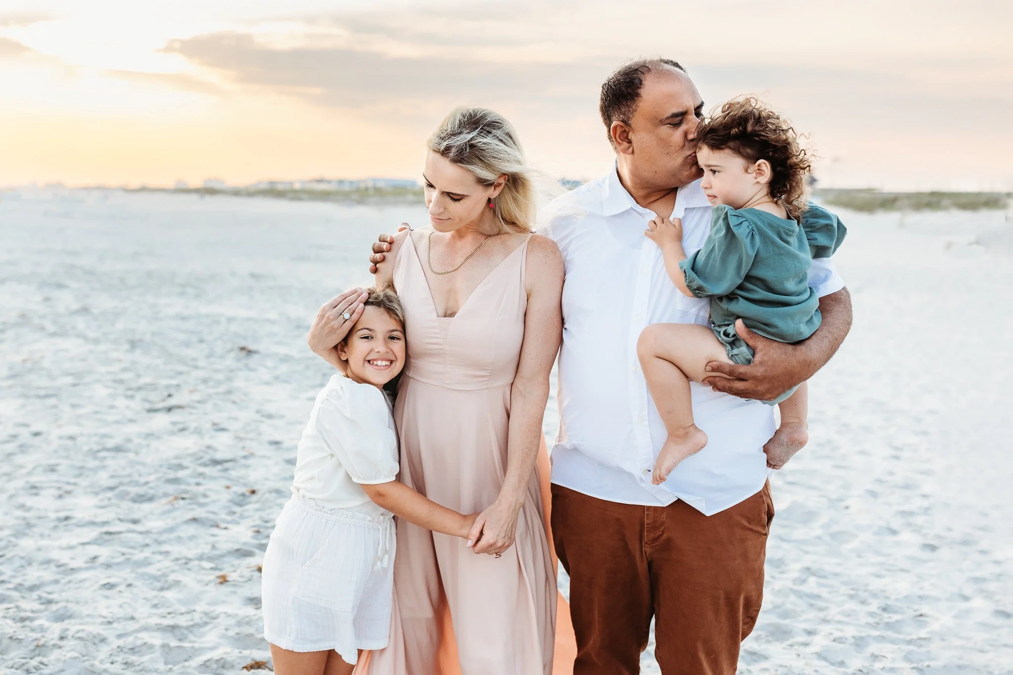Warm toned beach family photo color palette
