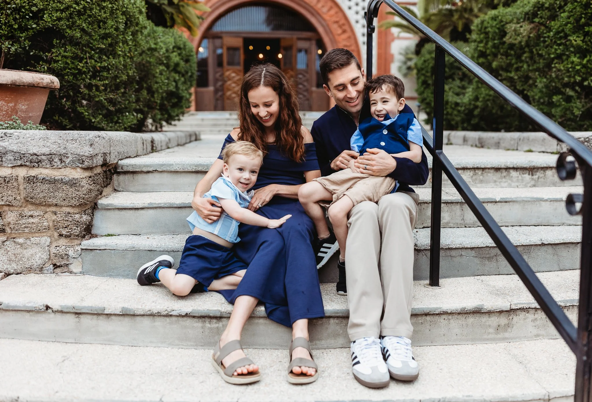 Candid family moments walking through historic St Augustine streets