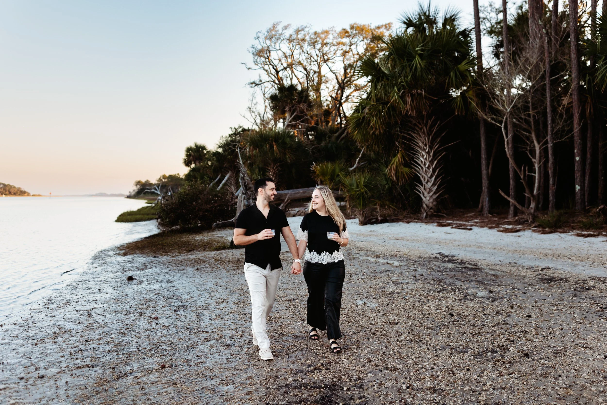 newly engaged couple walking together near St. Augustine