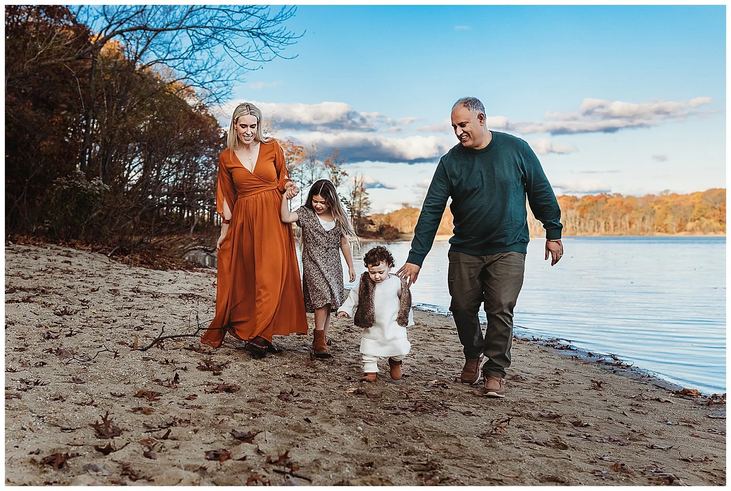 family in earth toned outfits for photos at alpine groves park in jacksonville