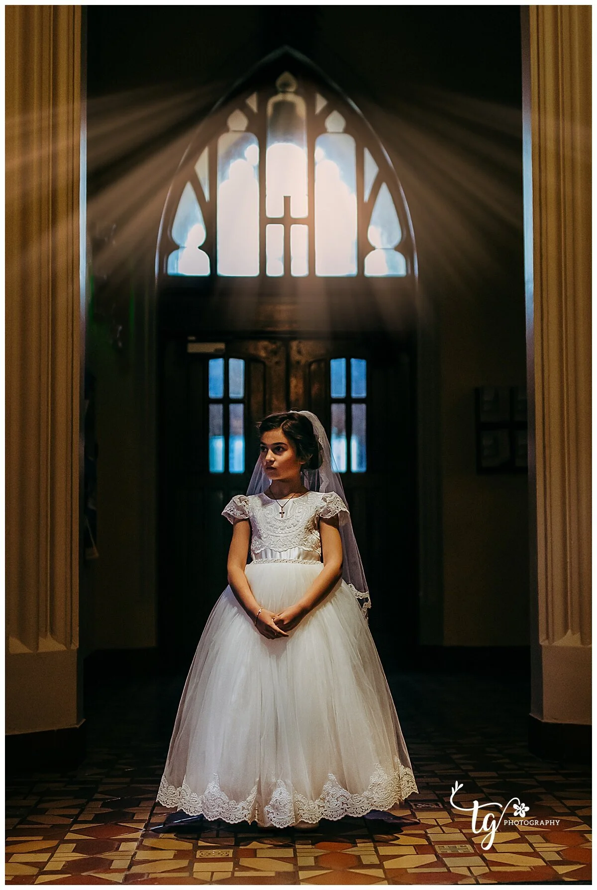 girl+in+church+with+rays+of+sunlight+