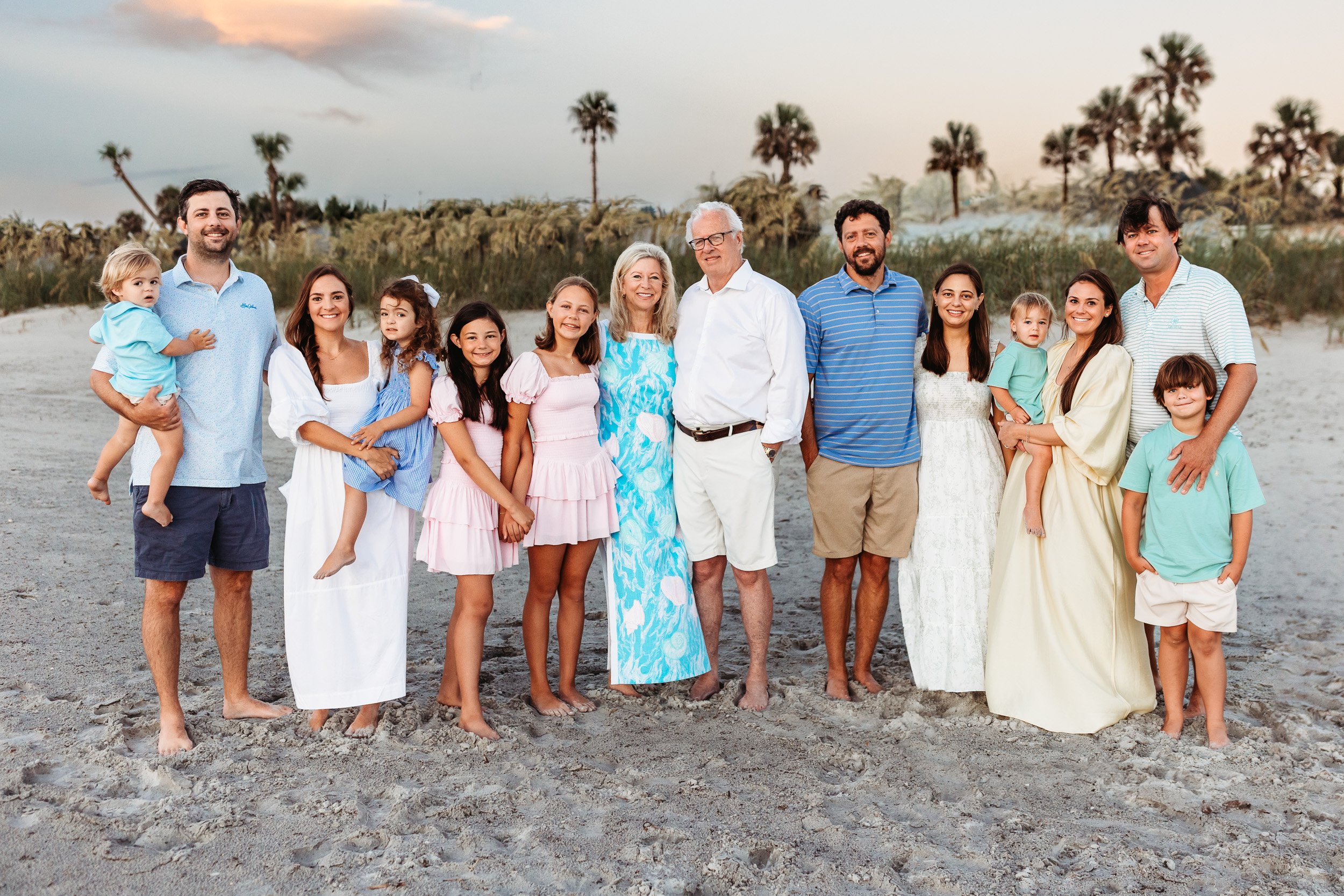 family on the beach at sunrise for family photos