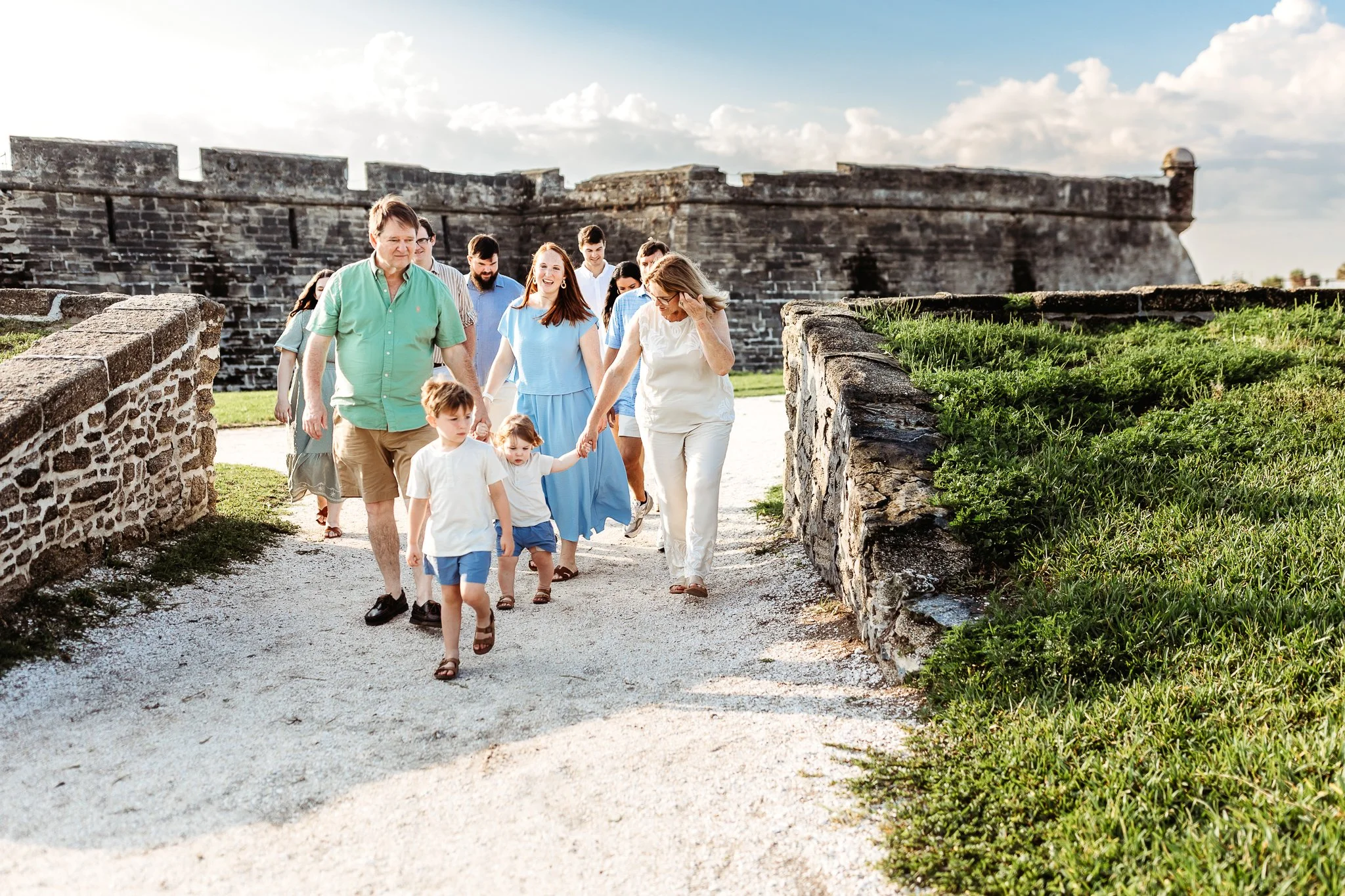 Extended family gathered in front of the St. Augustine Fort