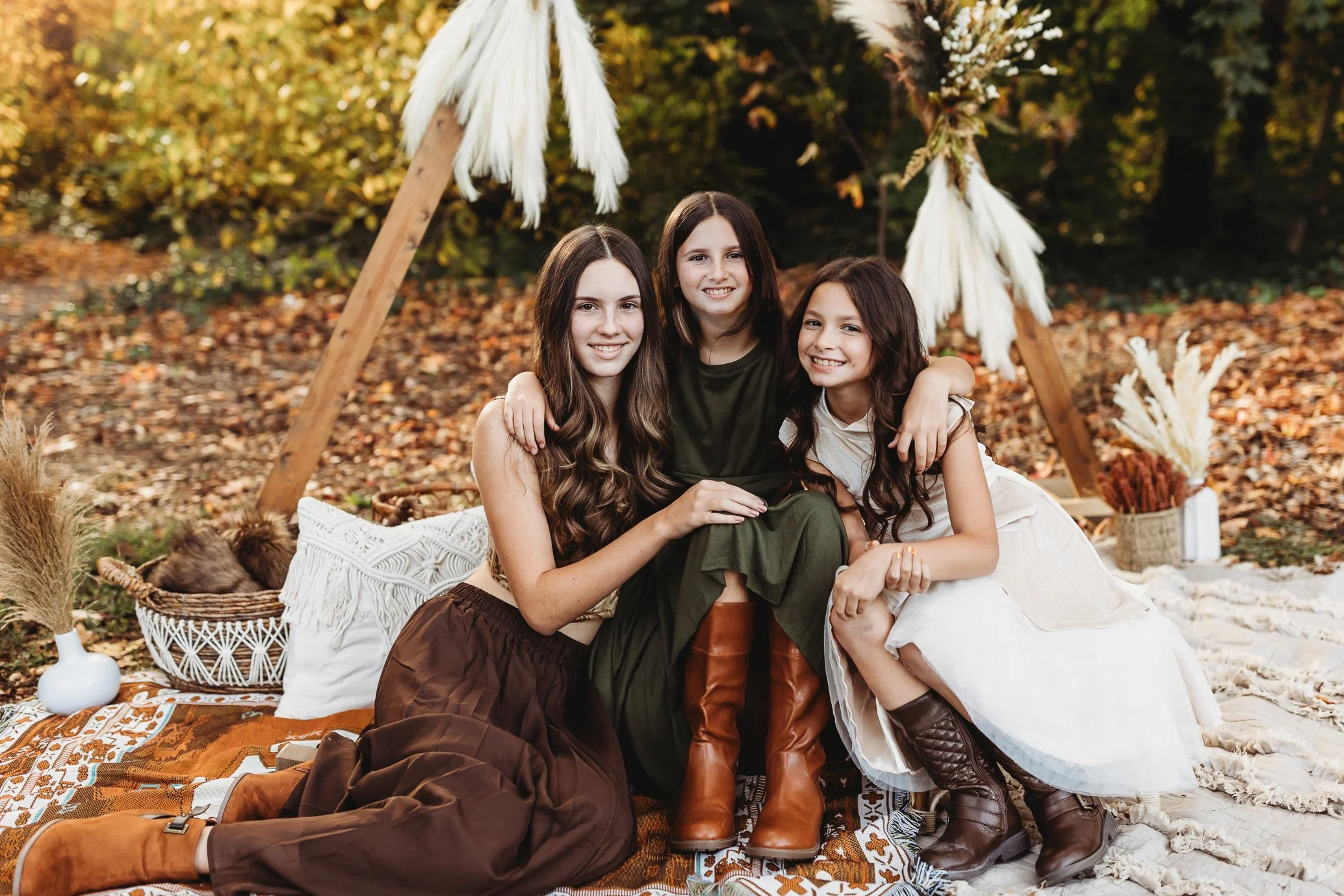 girls in earth tone boy outfits for fall family photos in nocatee