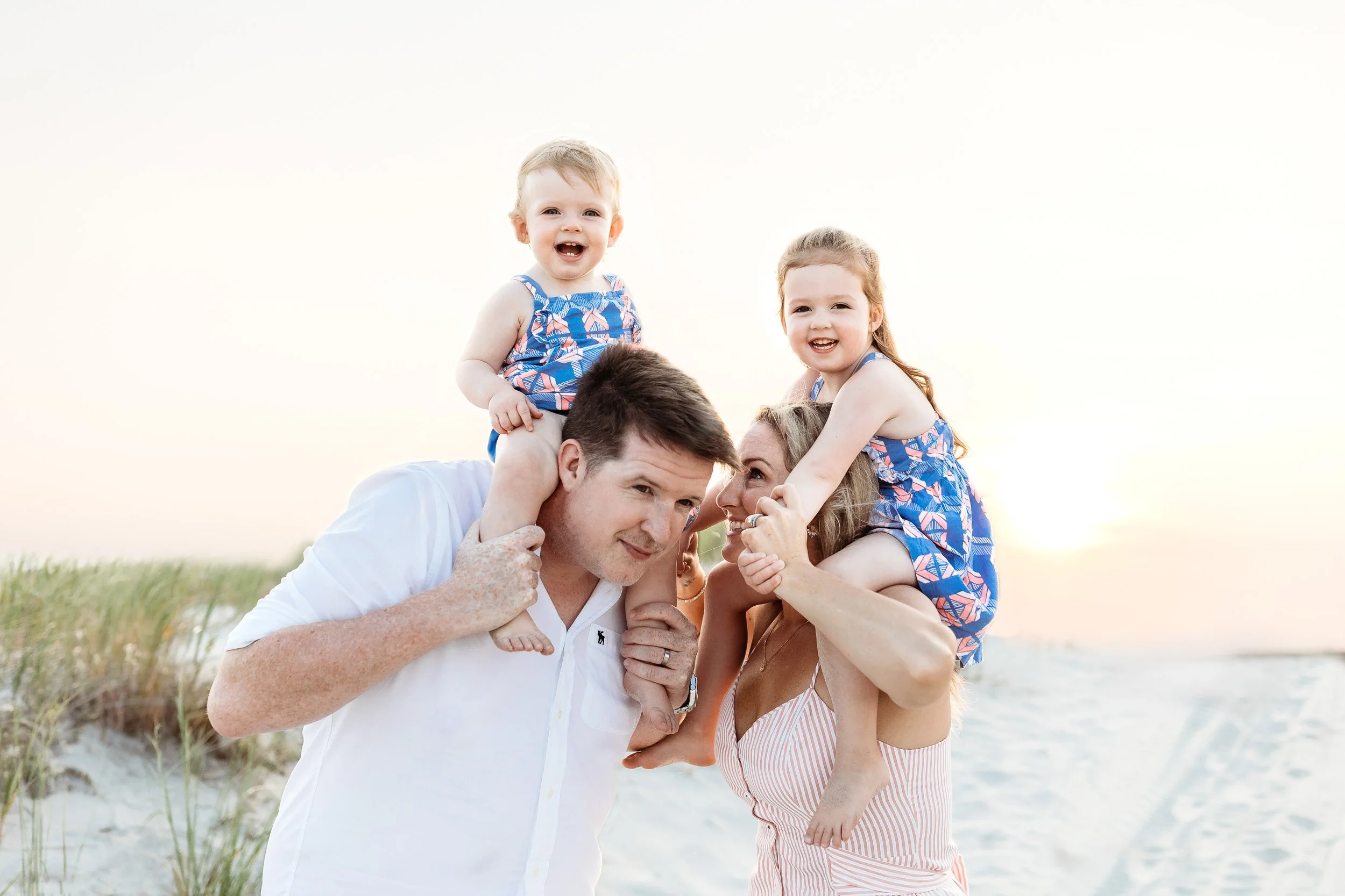 Natural family candid moment at the start of a lifestyle photography session in 32081