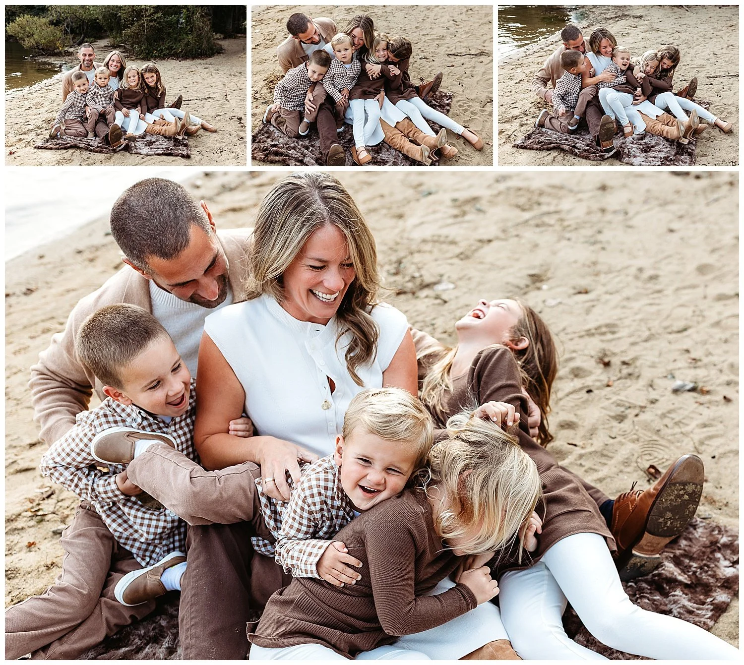 Parents gathering their four children close on a sandy shoreline.