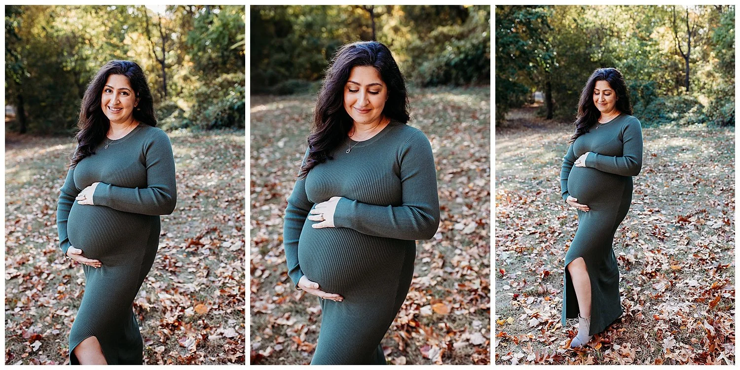 pregnant woman in pink blush maternity knit olive green dress holding belly and looking down at her bump