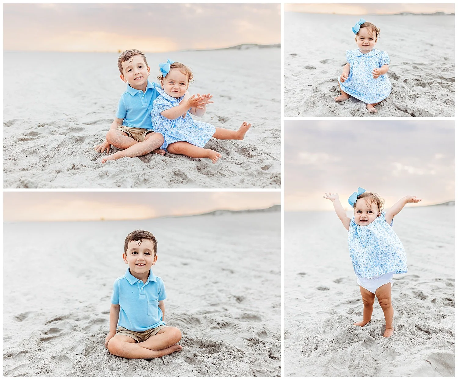 toddler girl in vintage style blue and white dress with arms up on a cloudy day at the beach and little boy seated in sand laughing