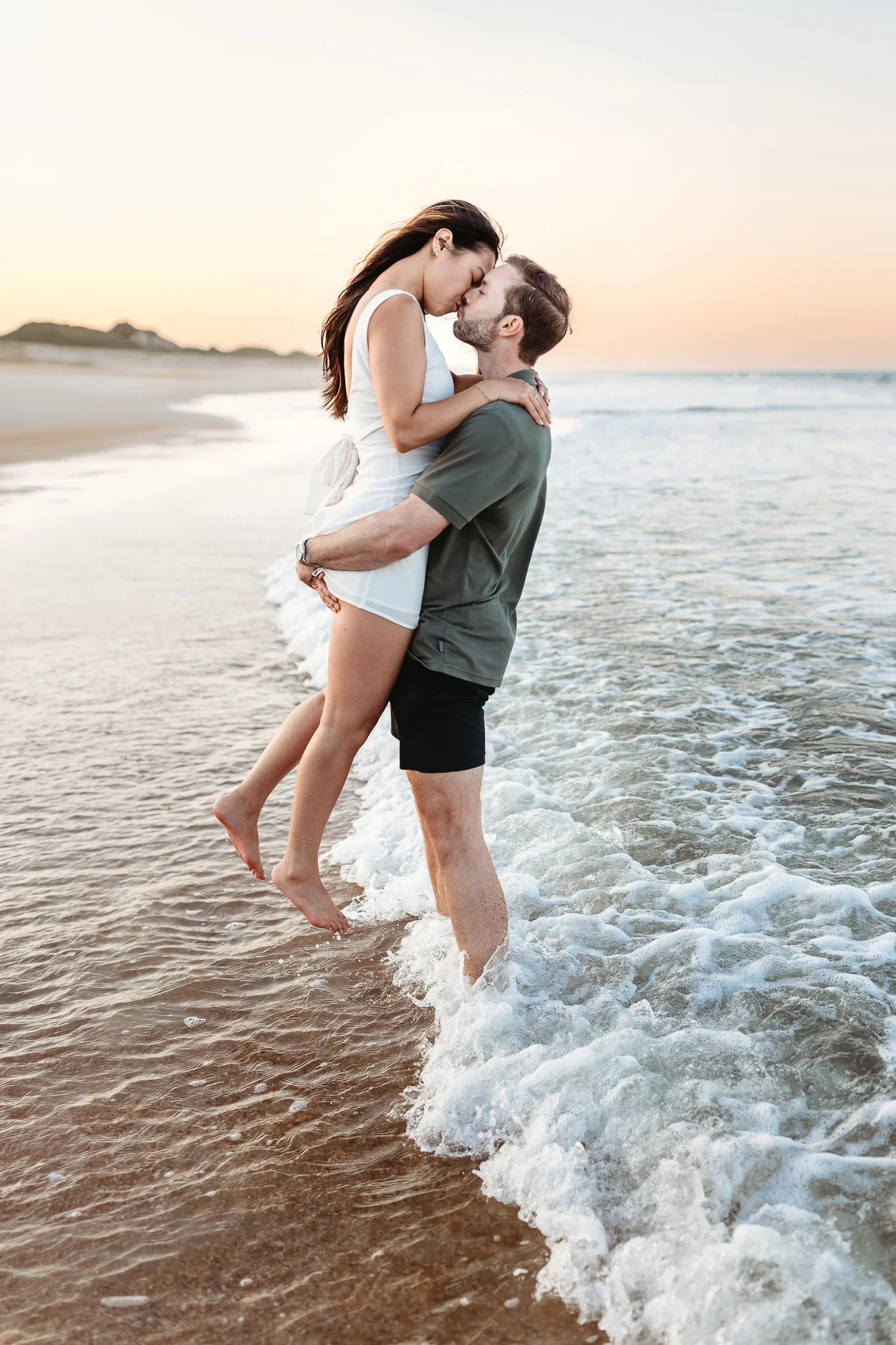 Soft romantic engagement photo of couple in natural light at Guana Preserve