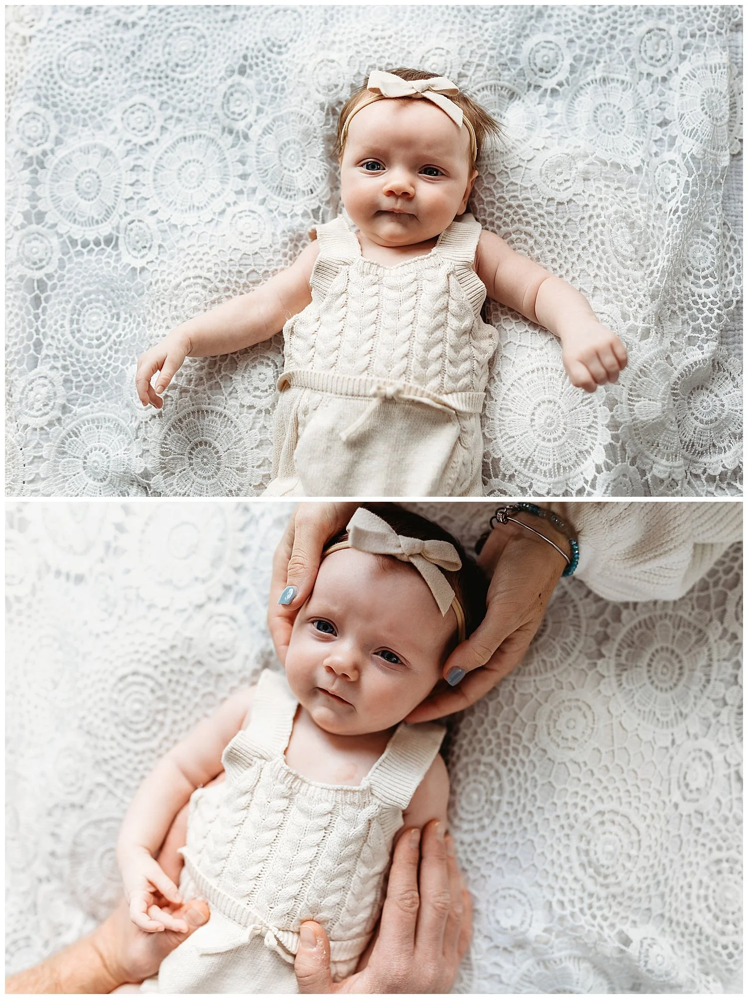 baby laying on lace blanket in tan onesie looking at camera with parents hands on her