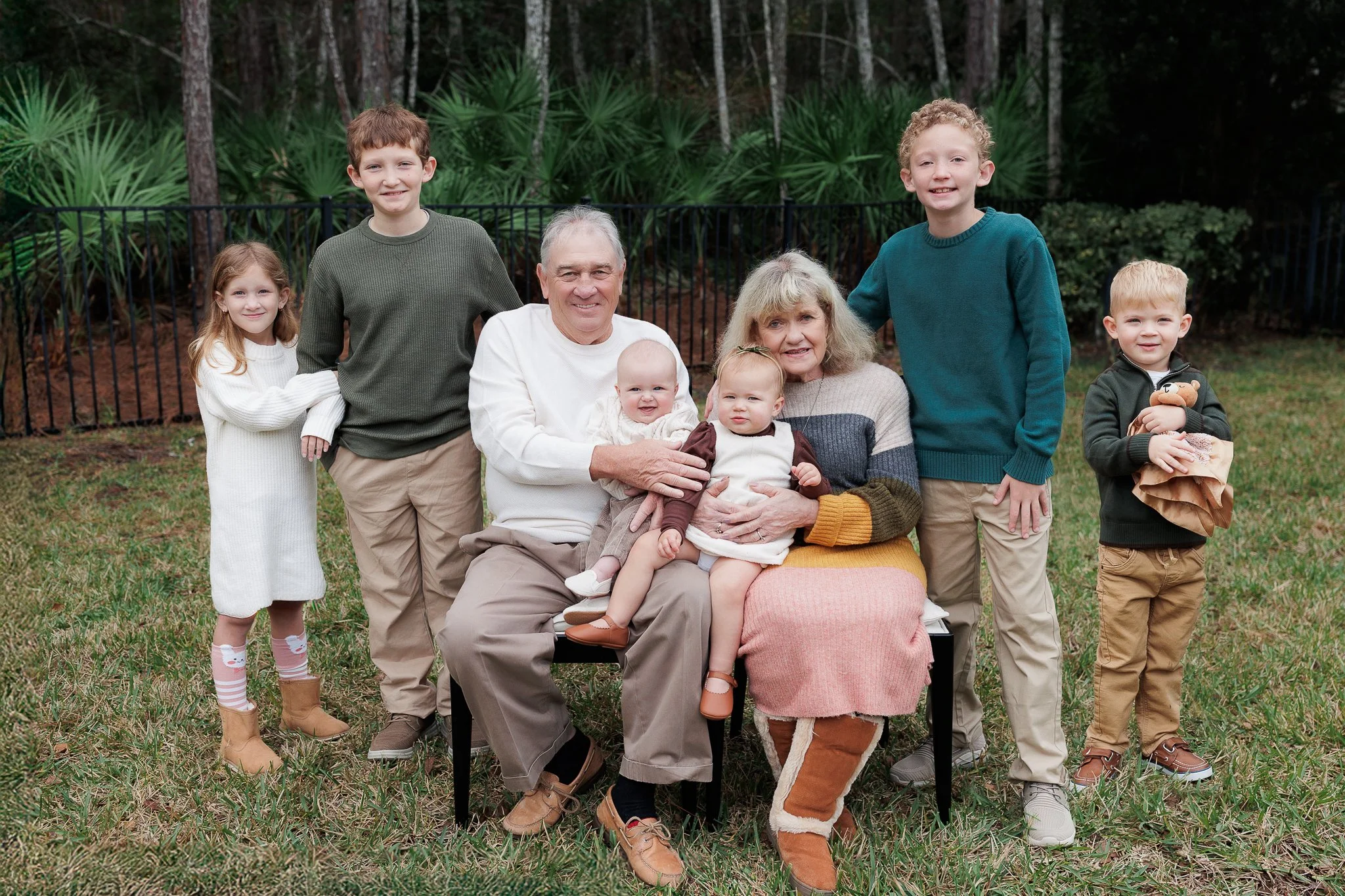 A behind-the-scenes moment during a Florida extended family photo session