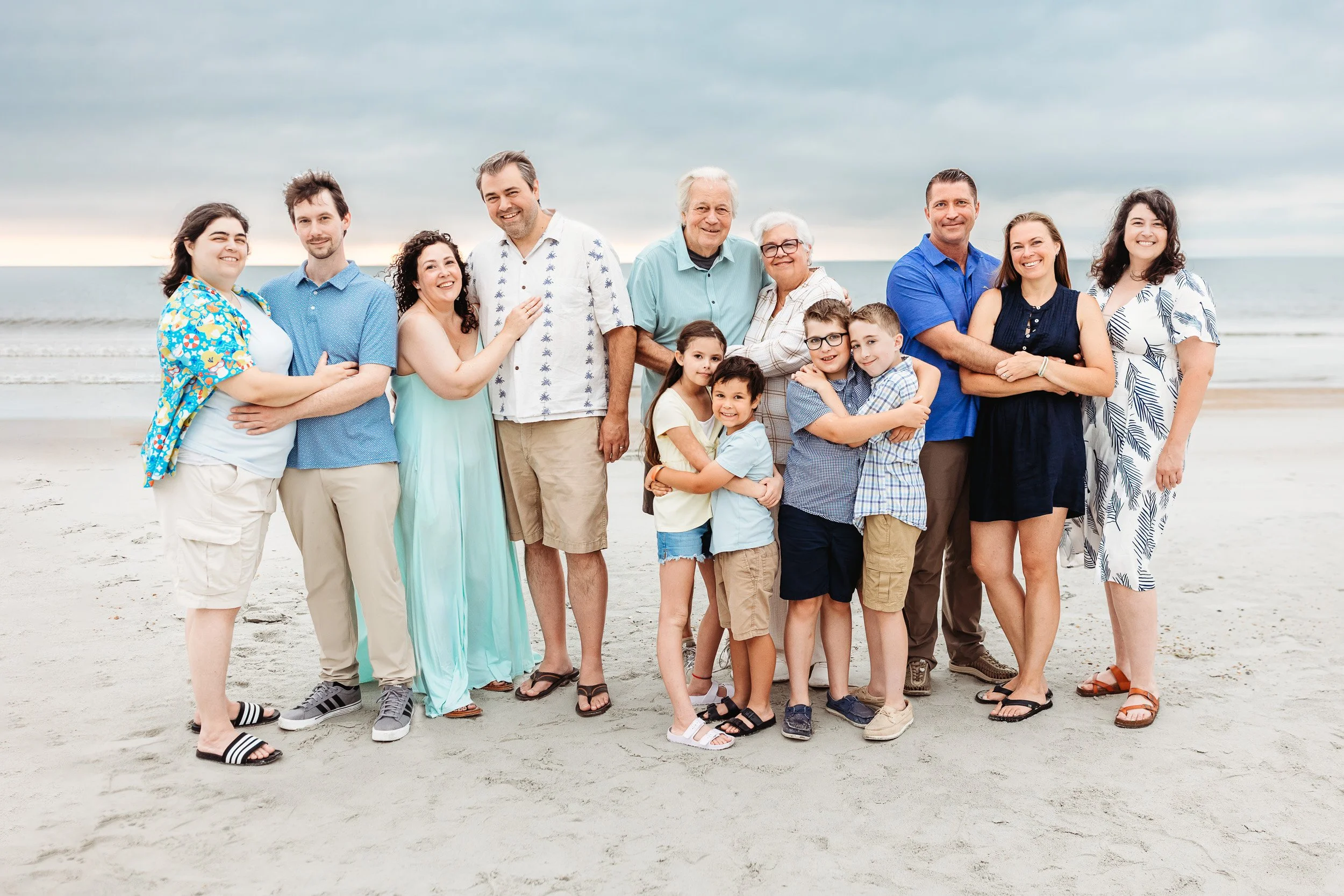 traditional family portrait n the beach in st augustine for a family vacation photos session