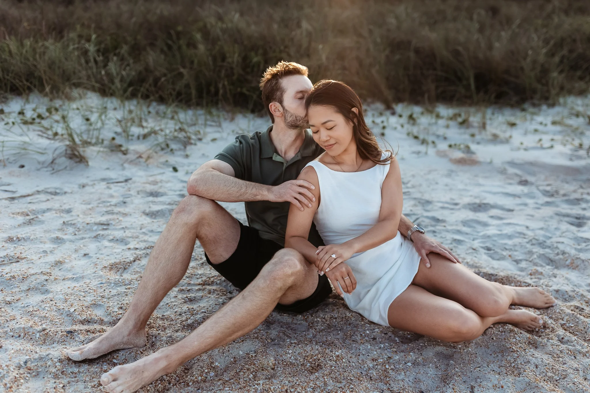 Romantic engagement portrait of couple at Guana middle beach after proposal