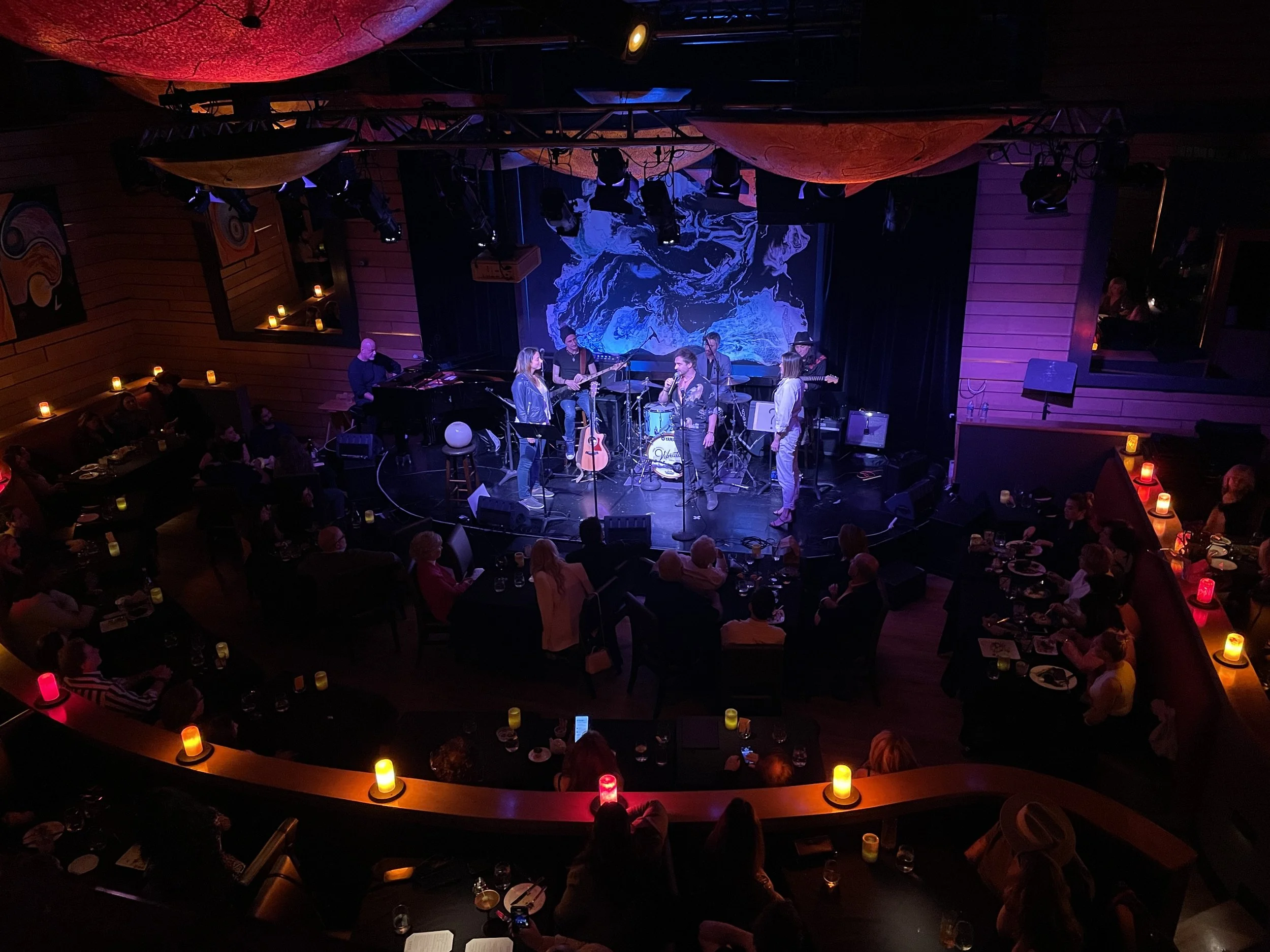 Riccardo Berdini performing a Magic and Music show at the Vibrato, in Bel Air,  Los Angeles, California