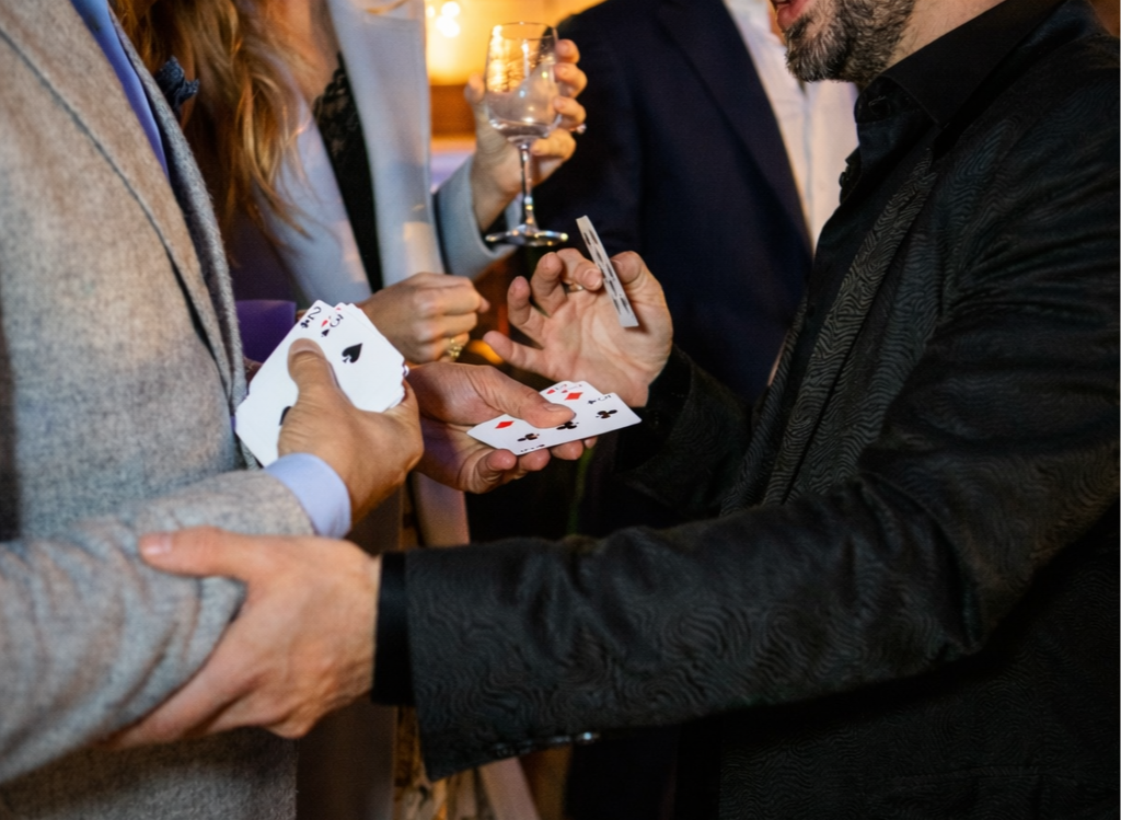 Riccardo Berdini performing close-up walk around magic at the Magic Castle, in Hollywood, Los Angeles, California
