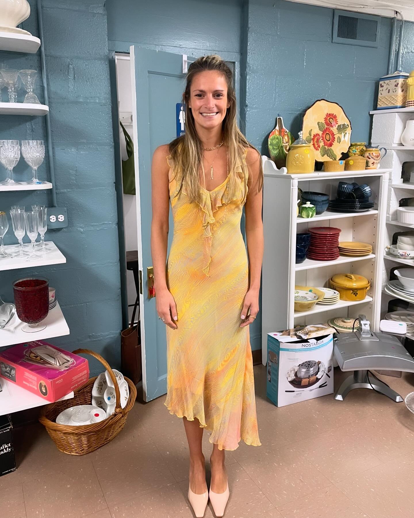 Our lovely customer had a special event coming up - a shower that she was attending. She was looking for the perfect dress and shoes to make a lasting impression. As she entered our store, our team was ready to assist her in every way possible.

Afte