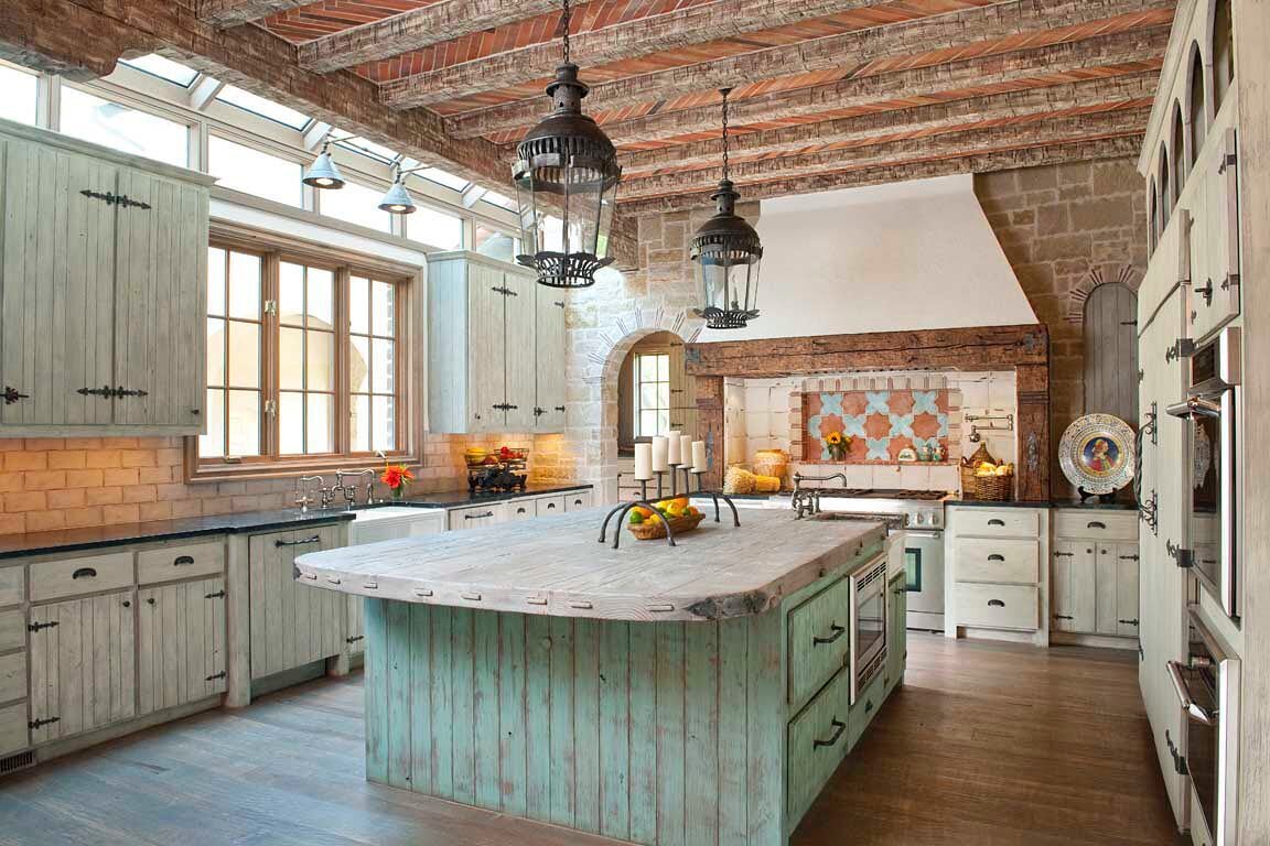 We love a kitchen with character😍
&hellip;
Exposed beams and antique French lanterns meet a limed wooden island and green cabinets to create a warm, rustic kitchen.
.
.
.
#interiordesign #ineriordesigner #interior #interiorstyling #homedecor #homede