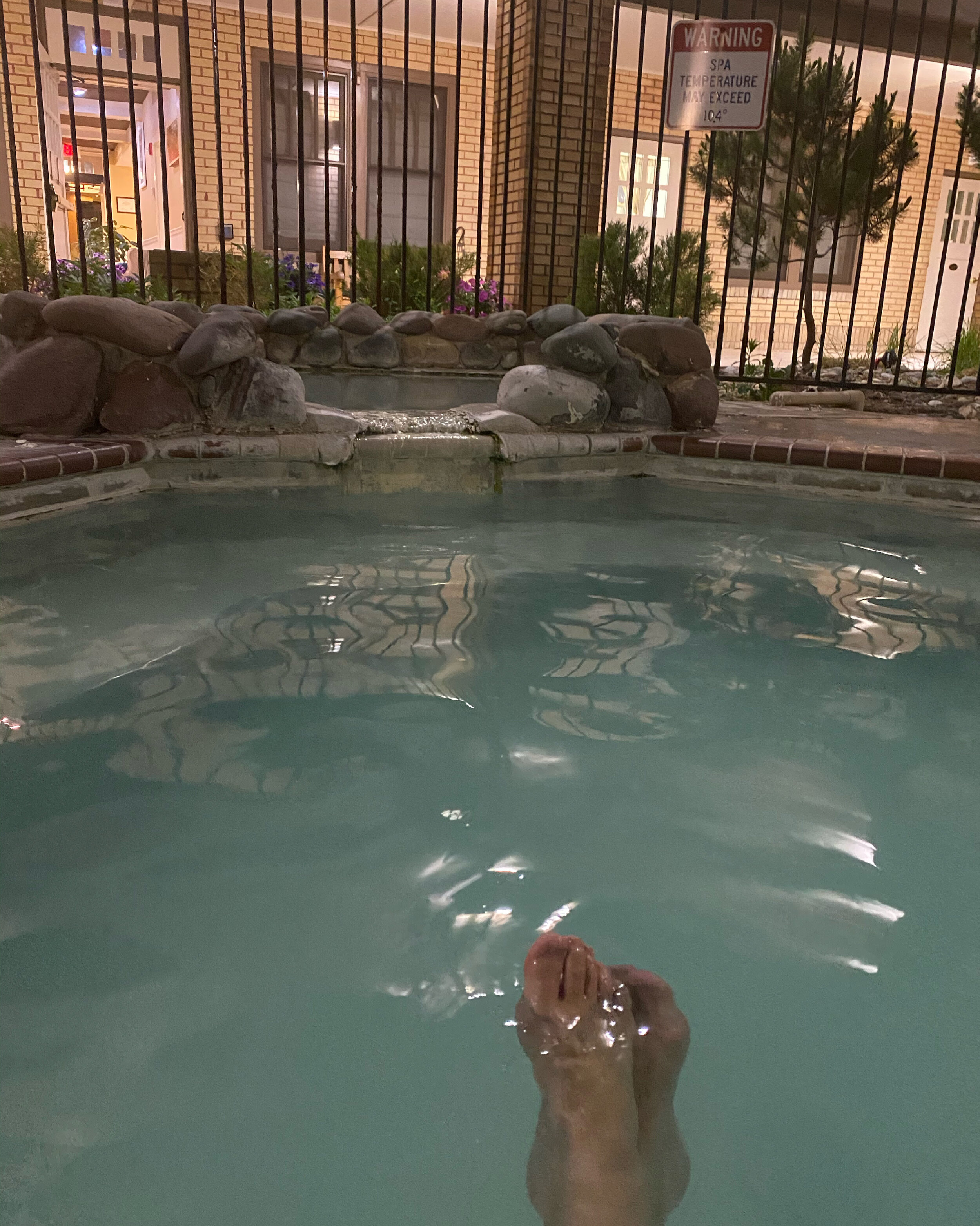 Relaxing in the Mineral Hot Spring at the Best Western Plaza Hotel.  Photo by Karen Boudreaux, May 28, 2021
