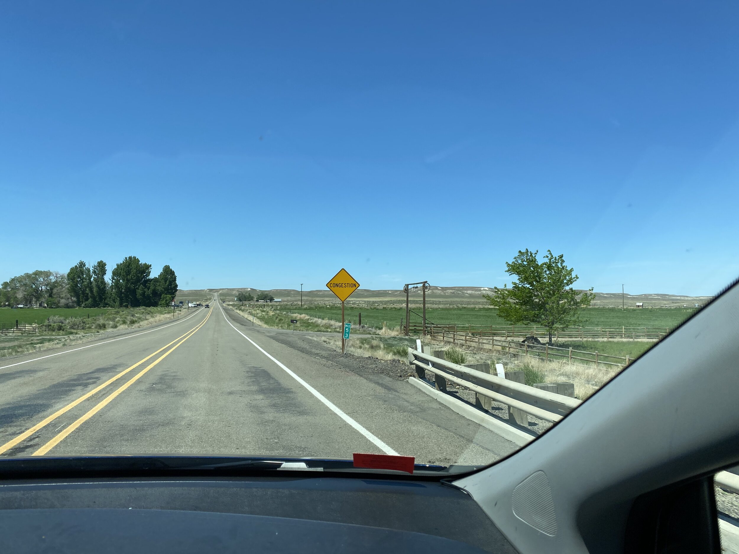 The sign warning of the upcoming congestion seemed rather relative for the area.  (Again, Jordan Valley, Oregon.)  Photo by Karen Boudreaux, June 4, 2021