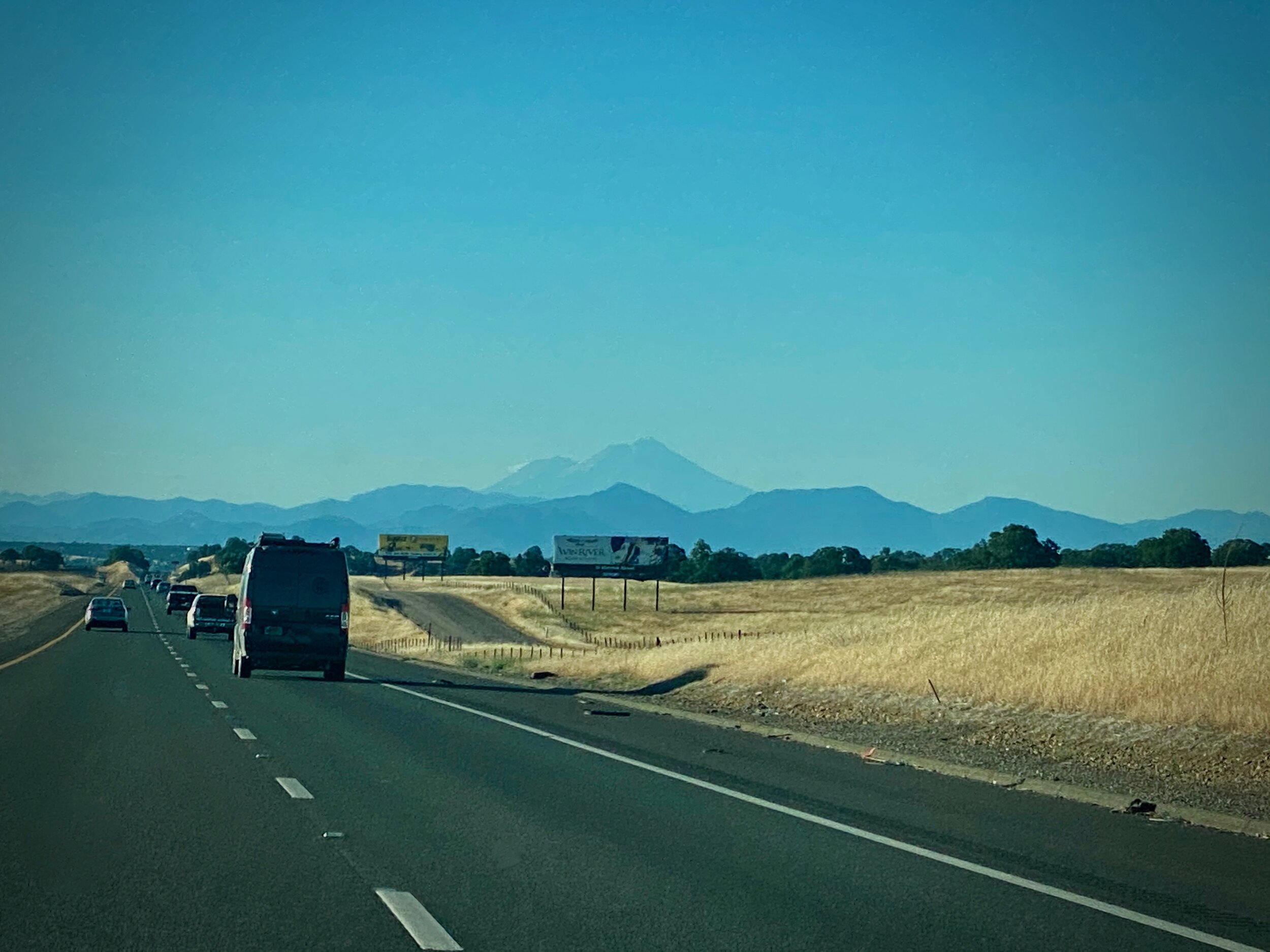 Mountain views on our way home from Chico to Redding, CA.  Photo by Karen Boudreaux, June 6, 2021