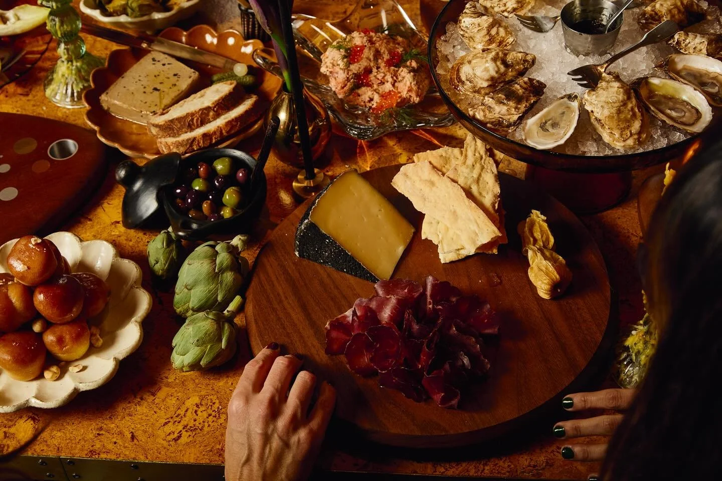 &ldquo;Lazy&rdquo; Susan has earned this upgrade! 

This spinner has long been the hardworking center of the communal dining table. While her true roots are ambiguous there is mention of revolving tables as far back as Chinese literature from 1300s. 
