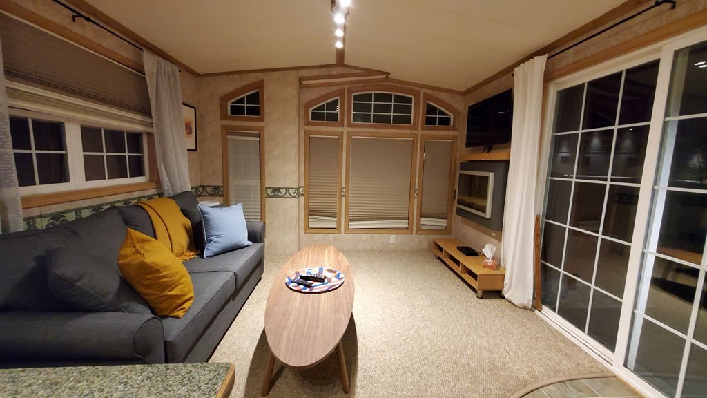 Hatchery Cabin 5 living room with a sofa and patio doors