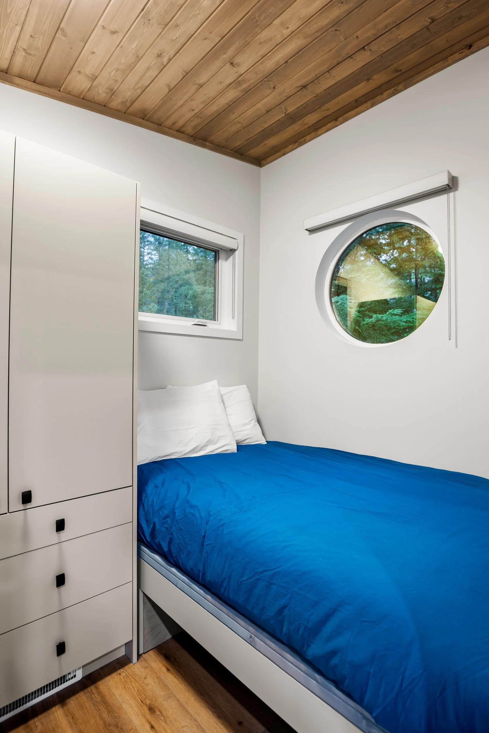 Second bedroom in the Shuswap with a porthole window