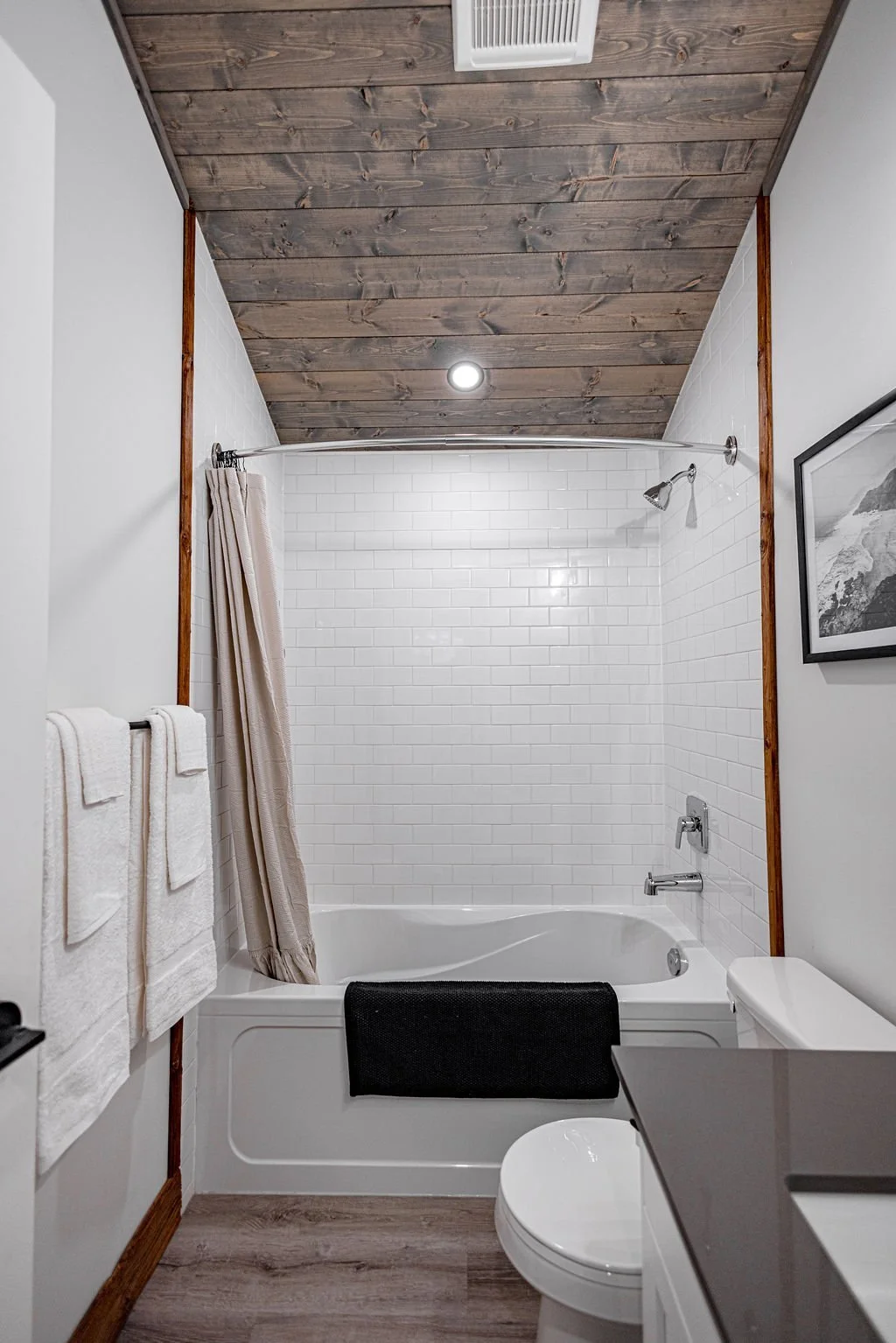 Apex bathroom with a tub and shower
