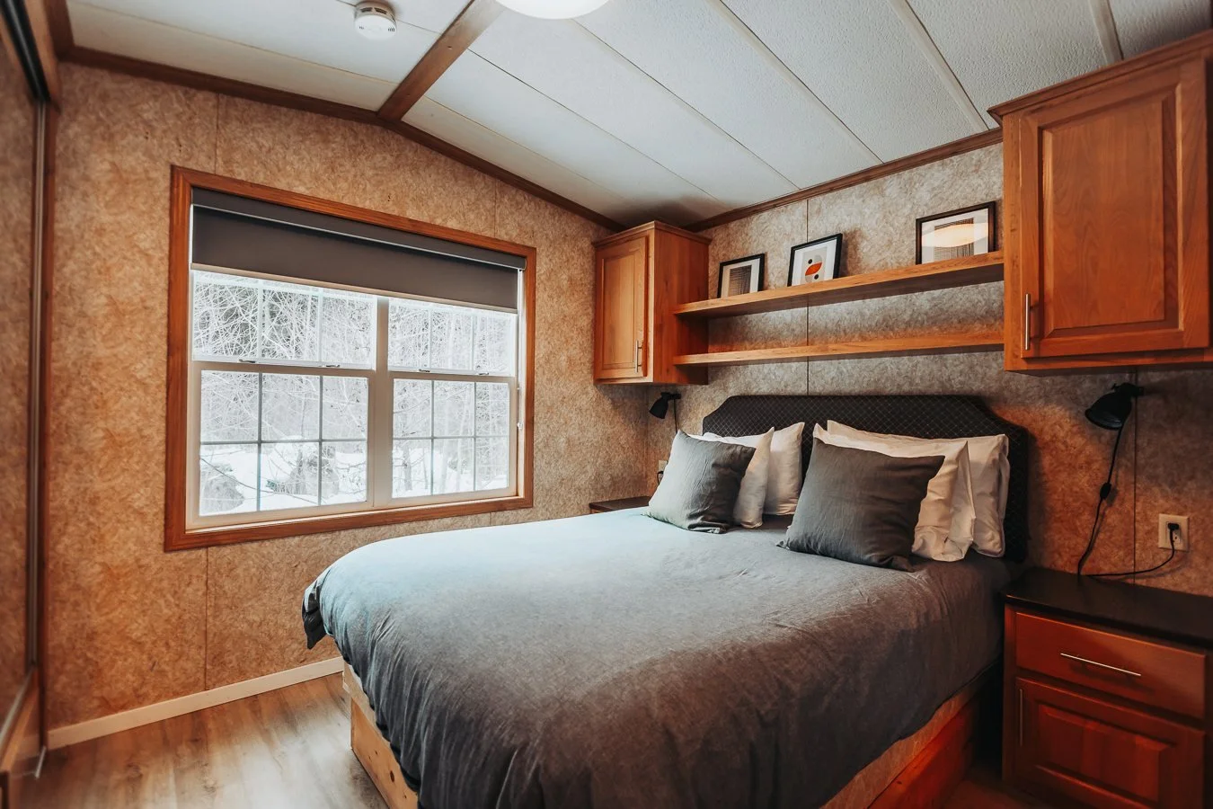 Hatchery Cabin 5 king bedroom with wood panelling