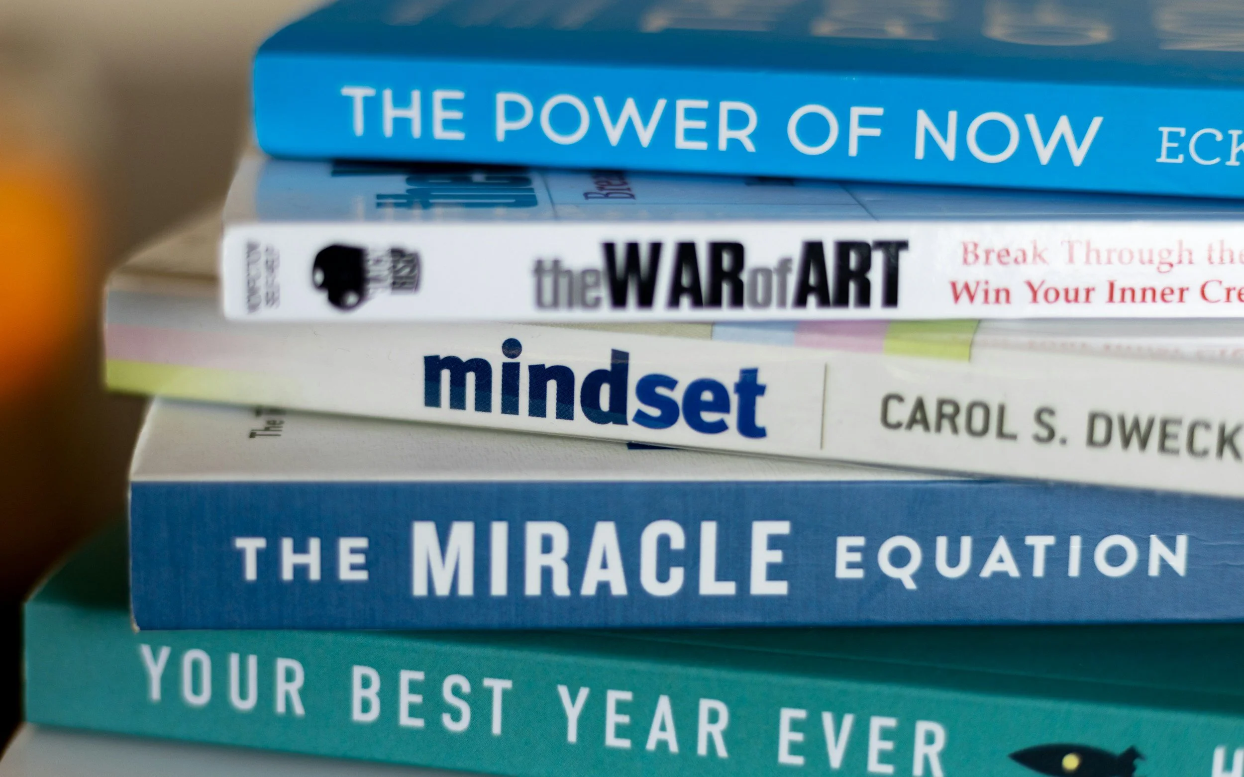 stack of mental health books