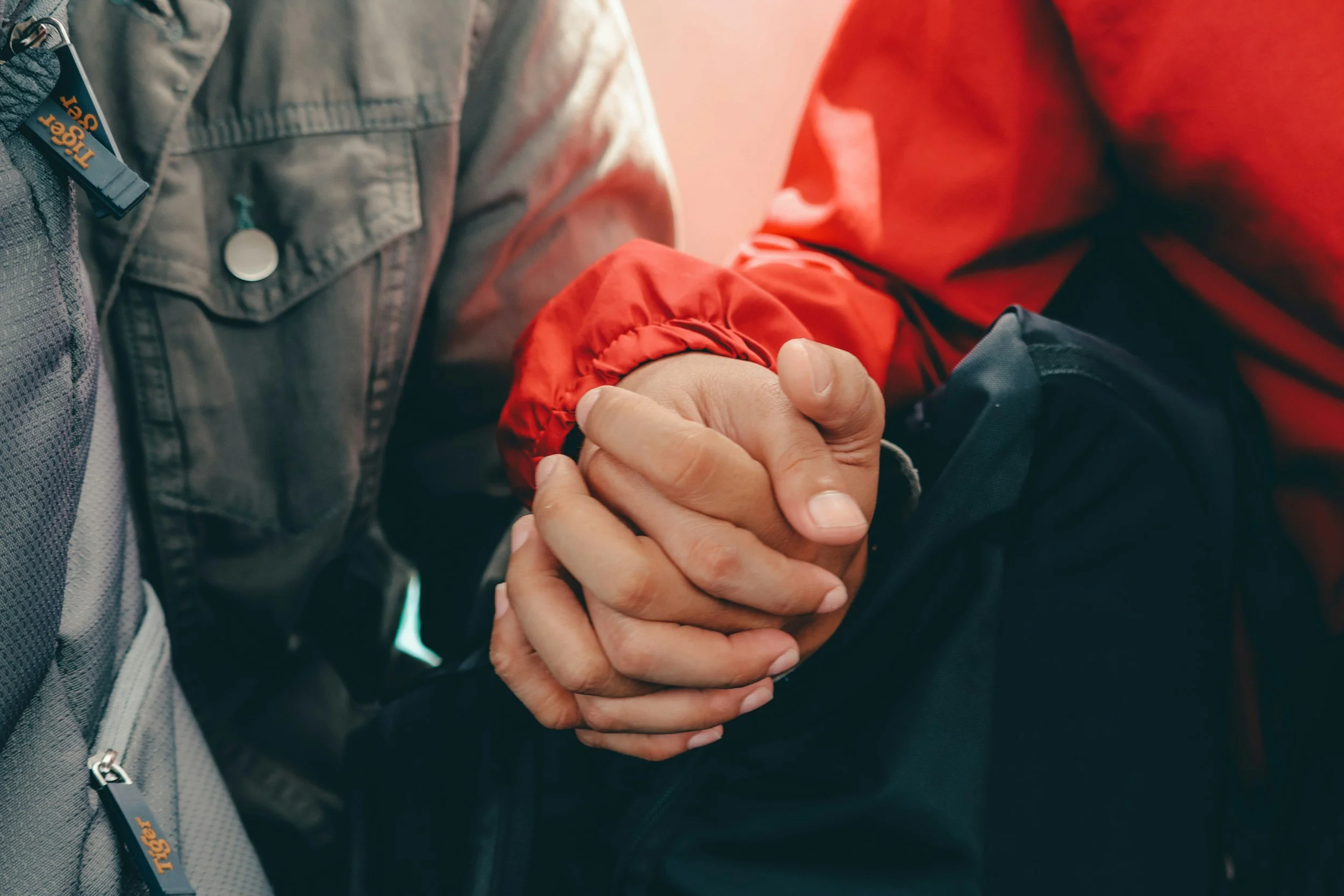 partners supporting one another in group therapy