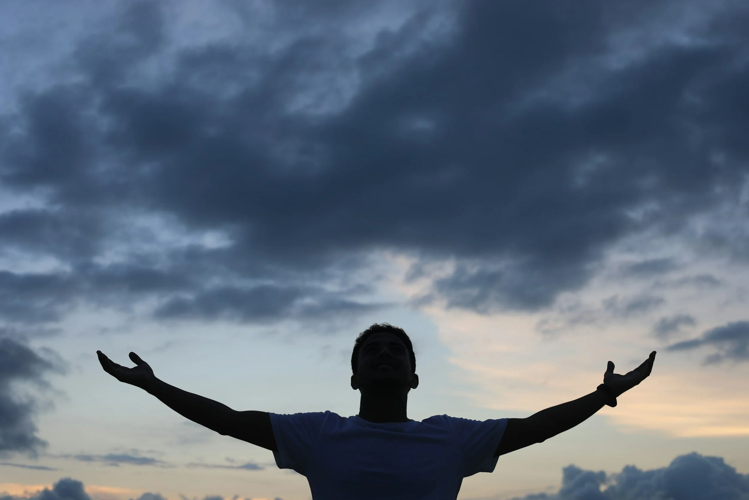 A person embracing the day, choosing and living the answer