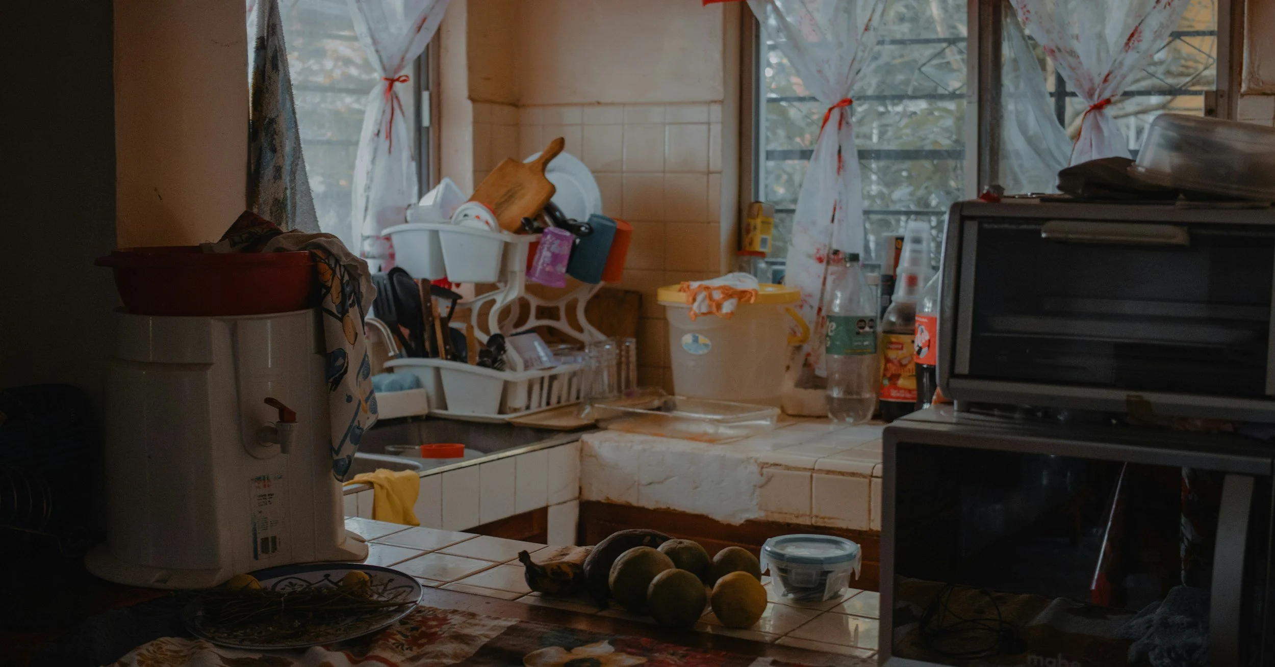 Sunlit home with summer clutter, routines built for a season that ended.