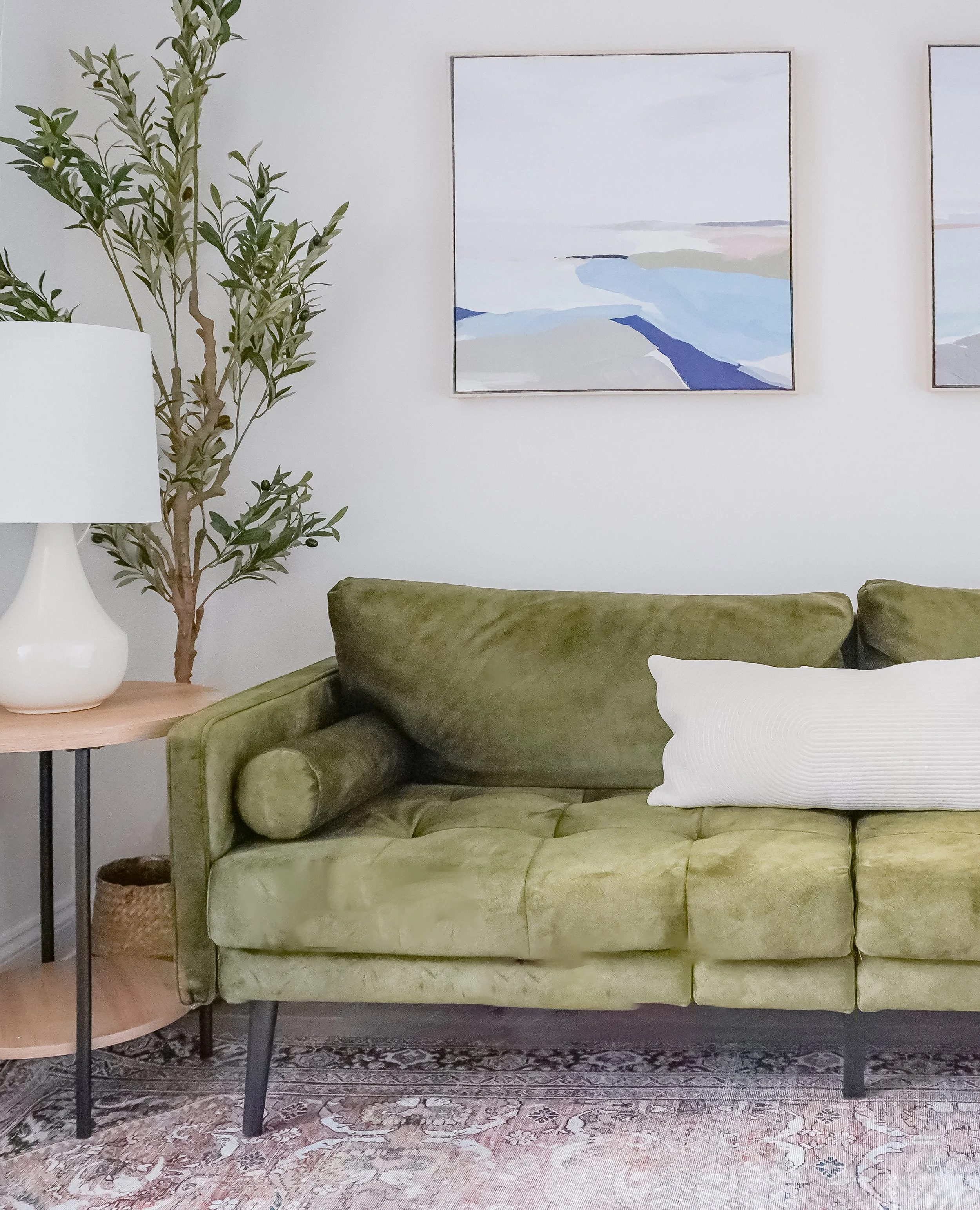 comfy green couch in one of our locations